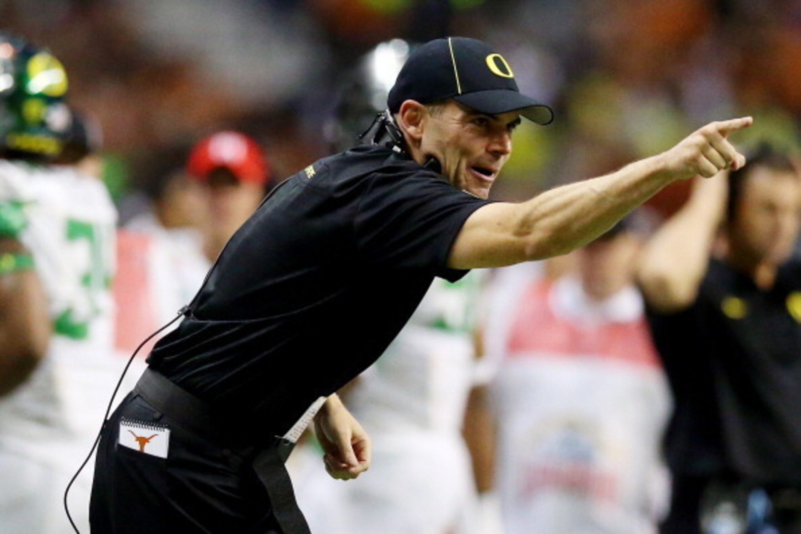 SAN ANTONIO, TX - DECEMBER 30: Head coach Mark Helfrich of the Oregon Ducks reacts during the Valero Alamo Bowl against the Texas Longhorns at the Alamodome on December 30, 2013 in San Antonio, Texas. (Photo by Ronald Martinez/Getty Images) SAN ANTONIO, TX - DECEMBER 30: Head coach Mark Helfrich of the Oregon Ducks reacts during the Valero Alamo Bowl against the Texas Longhorns at the Alamodome on December 30, 2013 in San Antonio, Texas. (Photo by Ronald Martinez/Getty Images)