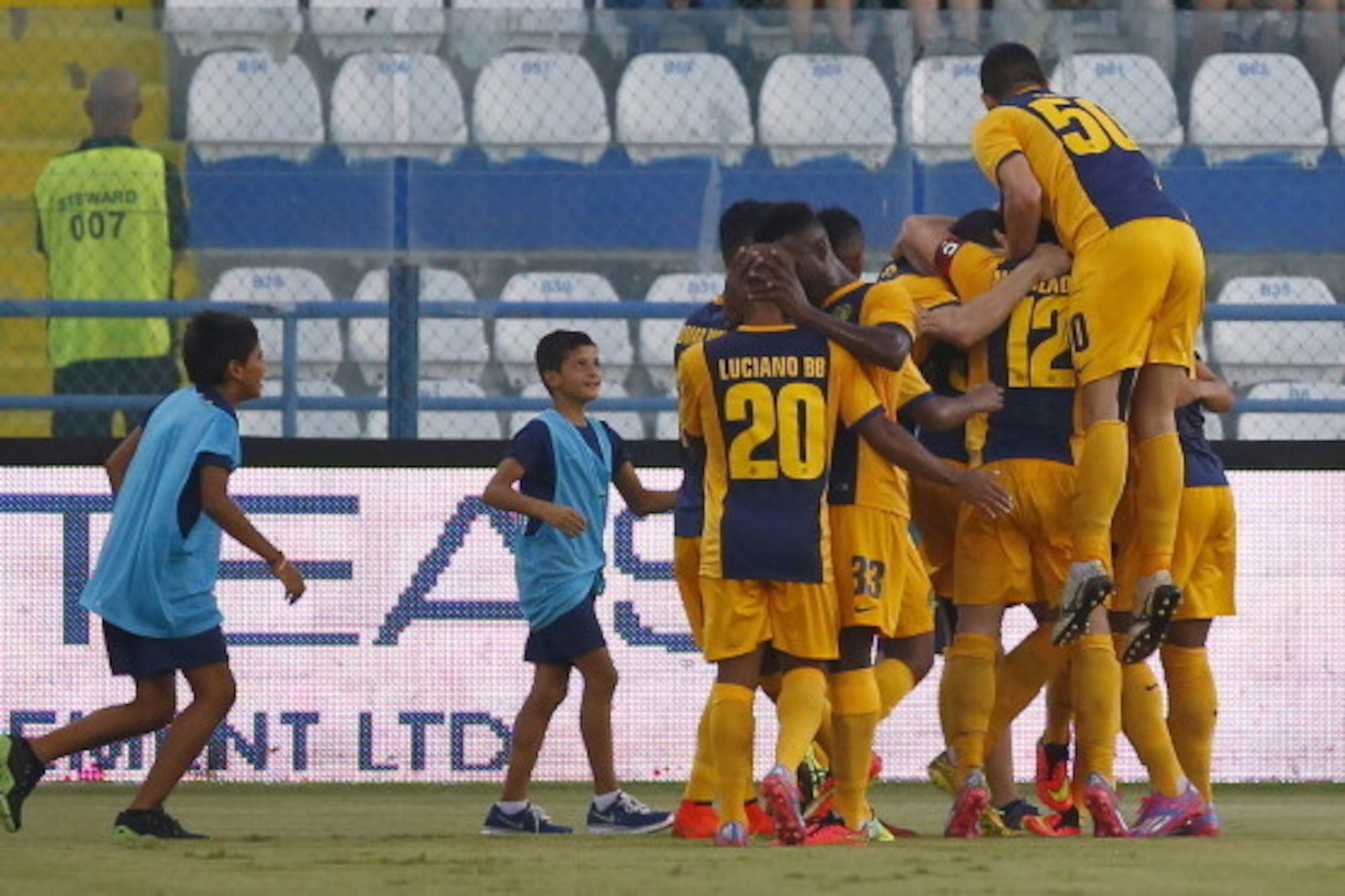 LARNACA, CYPRUS - AUGUST 21:  Players from AEL Limassol FC celebrate a goal during the AEL Limassol FC v  Tottenham Hotspur - UEFA Europa League Qualifying Play-Off match on August 21, 2014 in Larnaca, Cyprus.  (Photo by Andrew Caballero-Reynolds/Getty Im