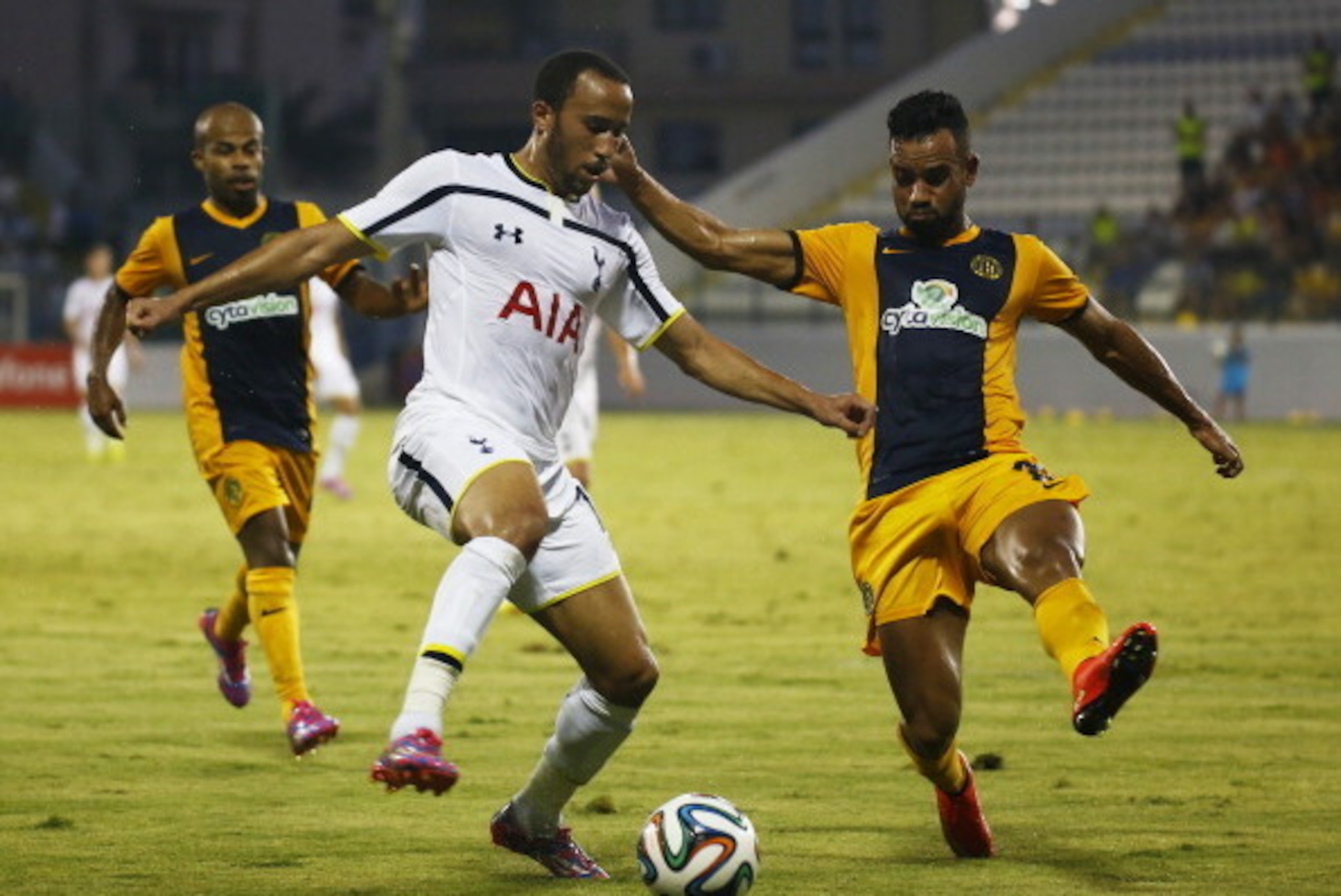 LARNACA, CYPRUS - AUGUST 21:  Darryl Townsend Andros (C) from Tottenham Hotspurfights for the ball with Edmar Lacerda da Silva from AEL Limassol FC during the AEL Limassol FC v  Tottenham Hotspur - UEFA Europa League Qualifying Play-Off match on August 21