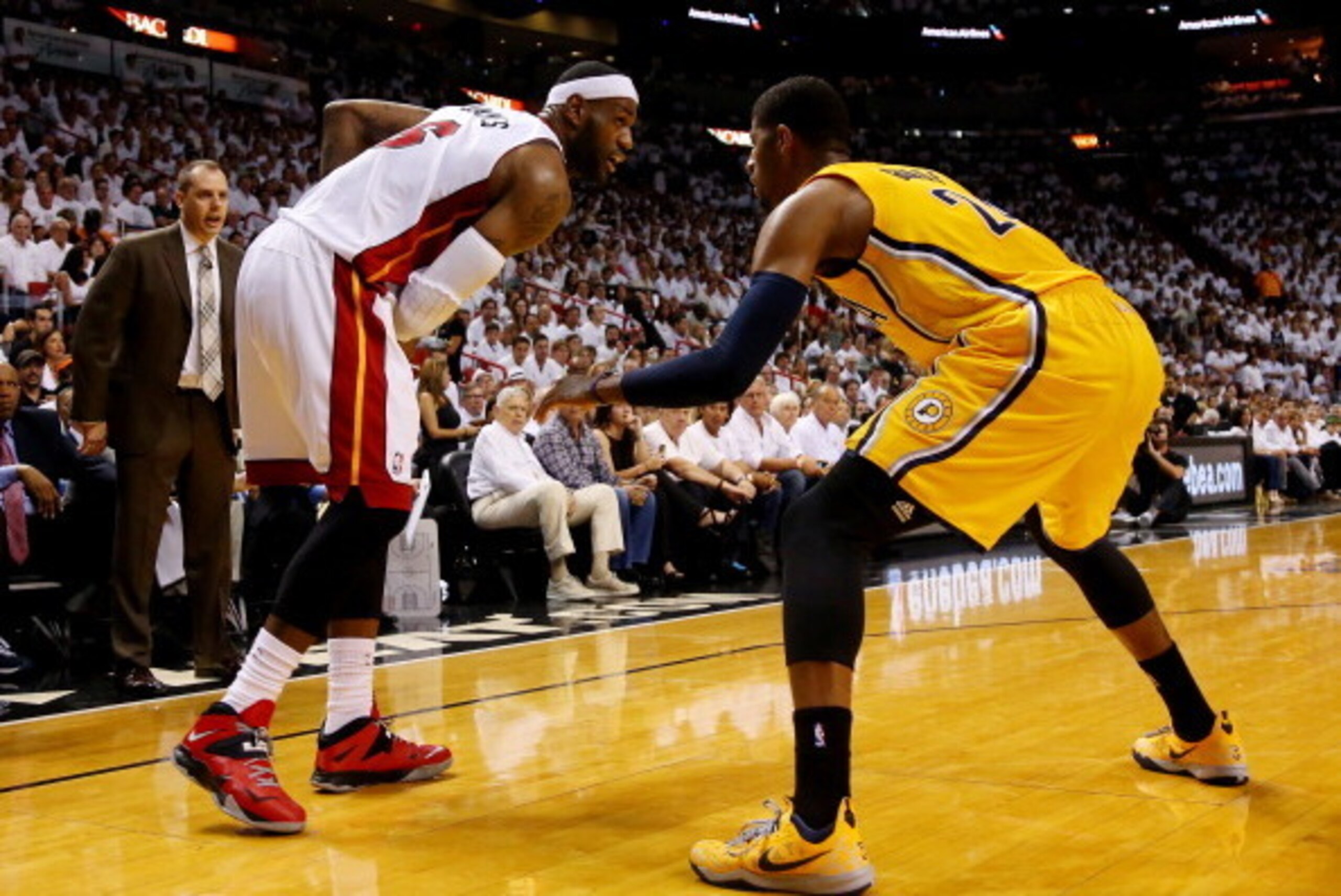 MIAMI, FL - MAY 30: Paul George #24 of the Indiana Pacers defends against LeBron James #6 of the Miami Heat during Game Six of the Eastern Conference Finals of the 2014 NBA Playoffs at American Airlines Arena on May 30, 2014 in Miami, Florida. NOTE TO US MIAMI, FL - MAY 30: Paul George #24 of the Indiana Pacers defends against LeBron James #6 of the Miami Heat during Game Six of the Eastern Conference Finals of the 2014 NBA Playoffs at American Airlines Arena on May 30, 2014 in Miami, Florida. NOTE TO US