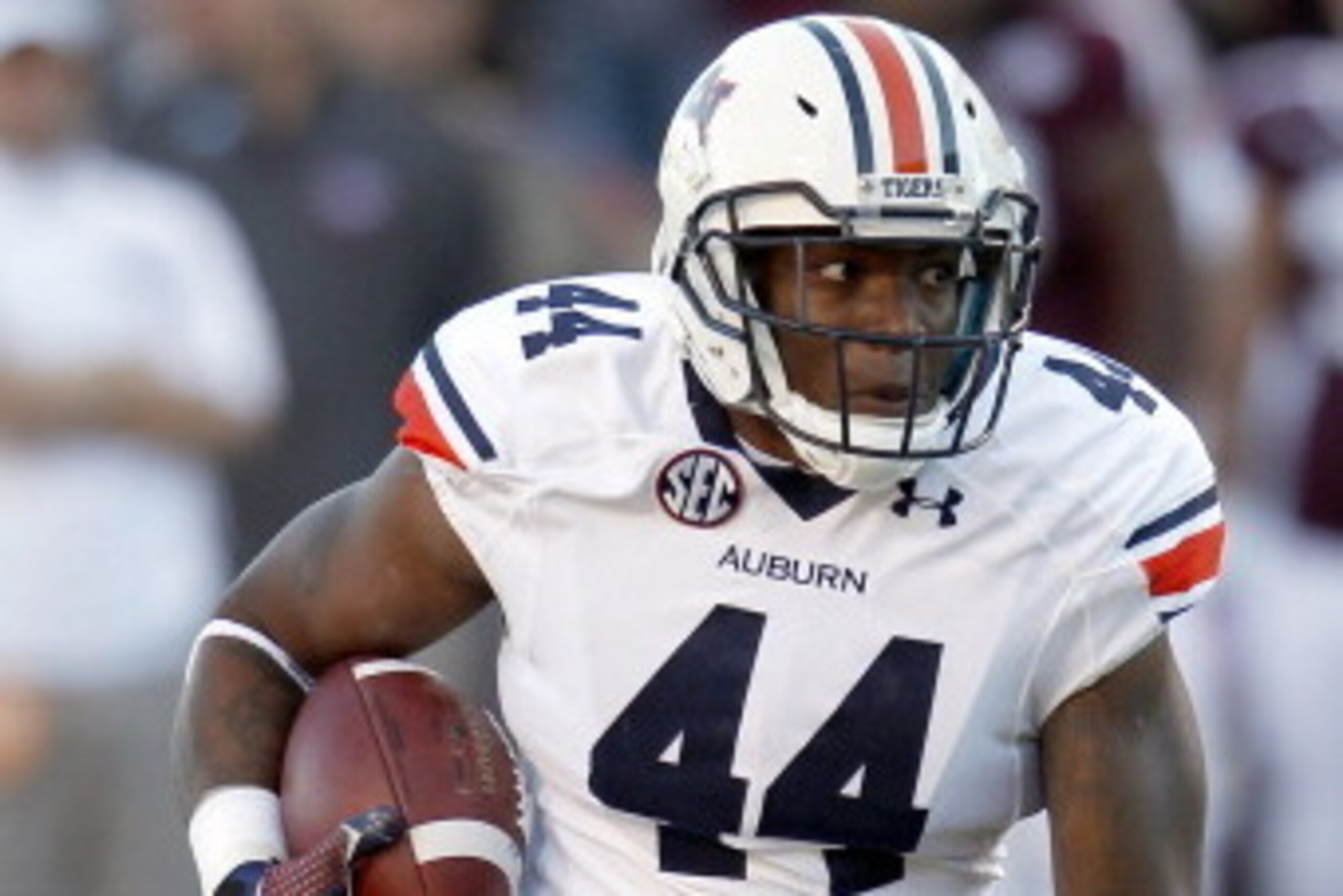 HOUSTON, TX - OCTOBER 19: Cameron Artis-Payne #44 of the Auburn Tigers rushes against the Texas A&M Aggies on October 19, 2013 at Kyle Field in College Station, Texas. Auburn Tigers won 45 to 41.(Photo by Thomas B. Shea/Getty Images)