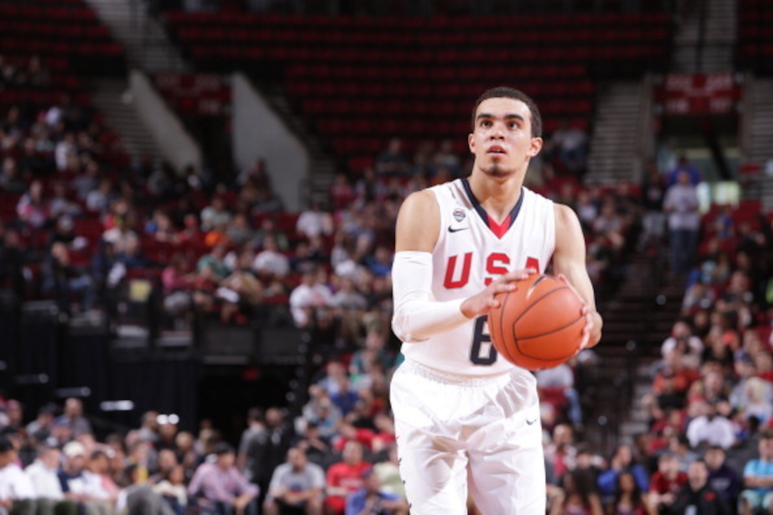 PORTLAND, OR - APRIL 12:  Tyus Jones #6 of Team USA shoots the ball against the World Team on April 12, 2014 at the Moda Center Arena in Portland, Oregon. NOTE TO USER: User expressly acknowledges and agrees that, by downloading and or using this photogra