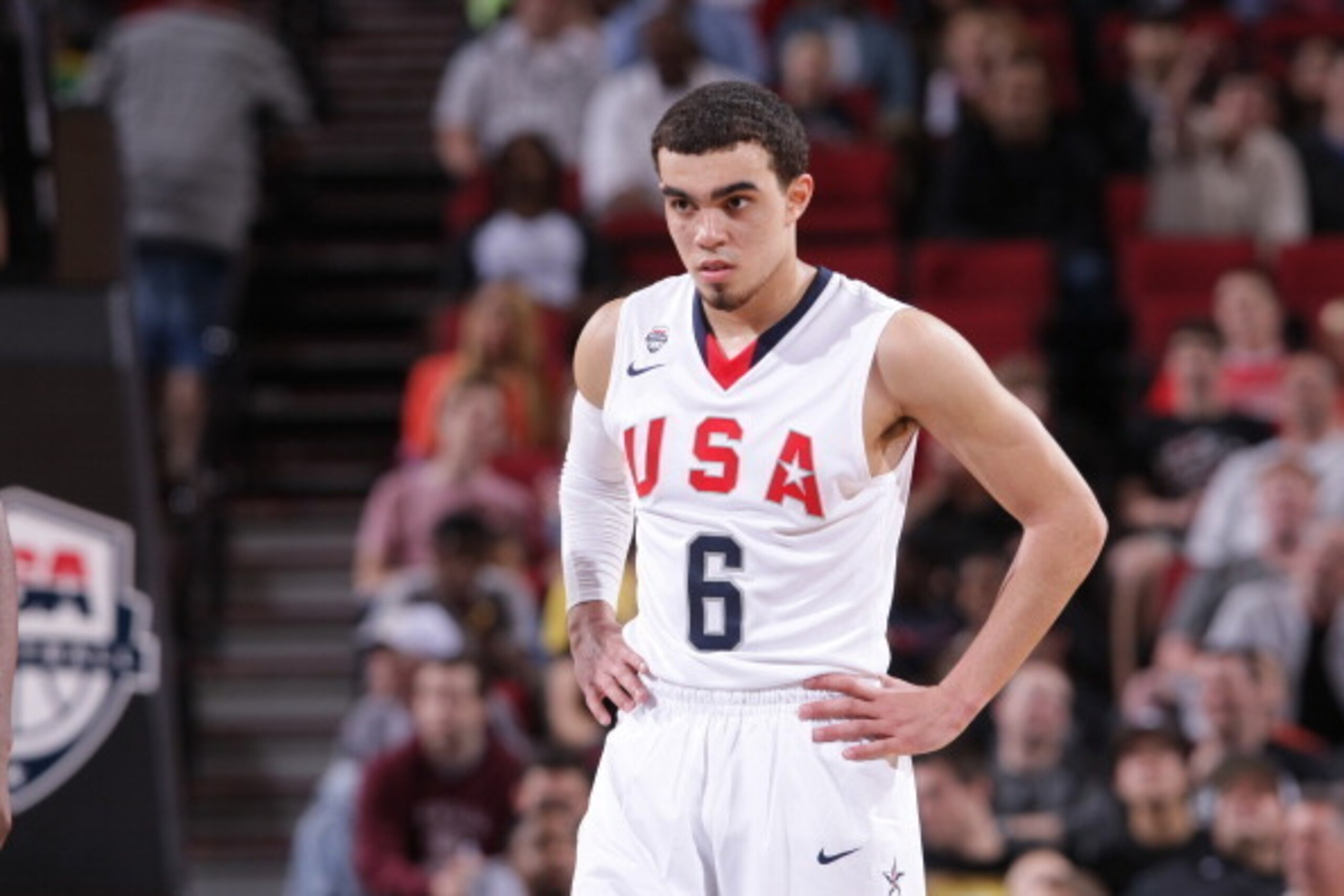 PORTLAND, OR - APRIL 12:  Tyus Jones #6 of the USA team stands on the court during the game against the World Team on April 12, 2014 at the Moda Center Arena in Portland, Oregon. NOTE TO USER: User expressly acknowledges and agrees that, by downloading an