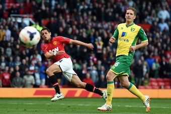 MANCHESTER, ENGLAND - APRIL 26:  Javier Hernandez of Manchester United fires in a shot at goal during the Barclays Premier League match between Manchester United and Norwich City at Old Trafford on April 26, 2014 in Manchester, England.  (Photo by Laurenc