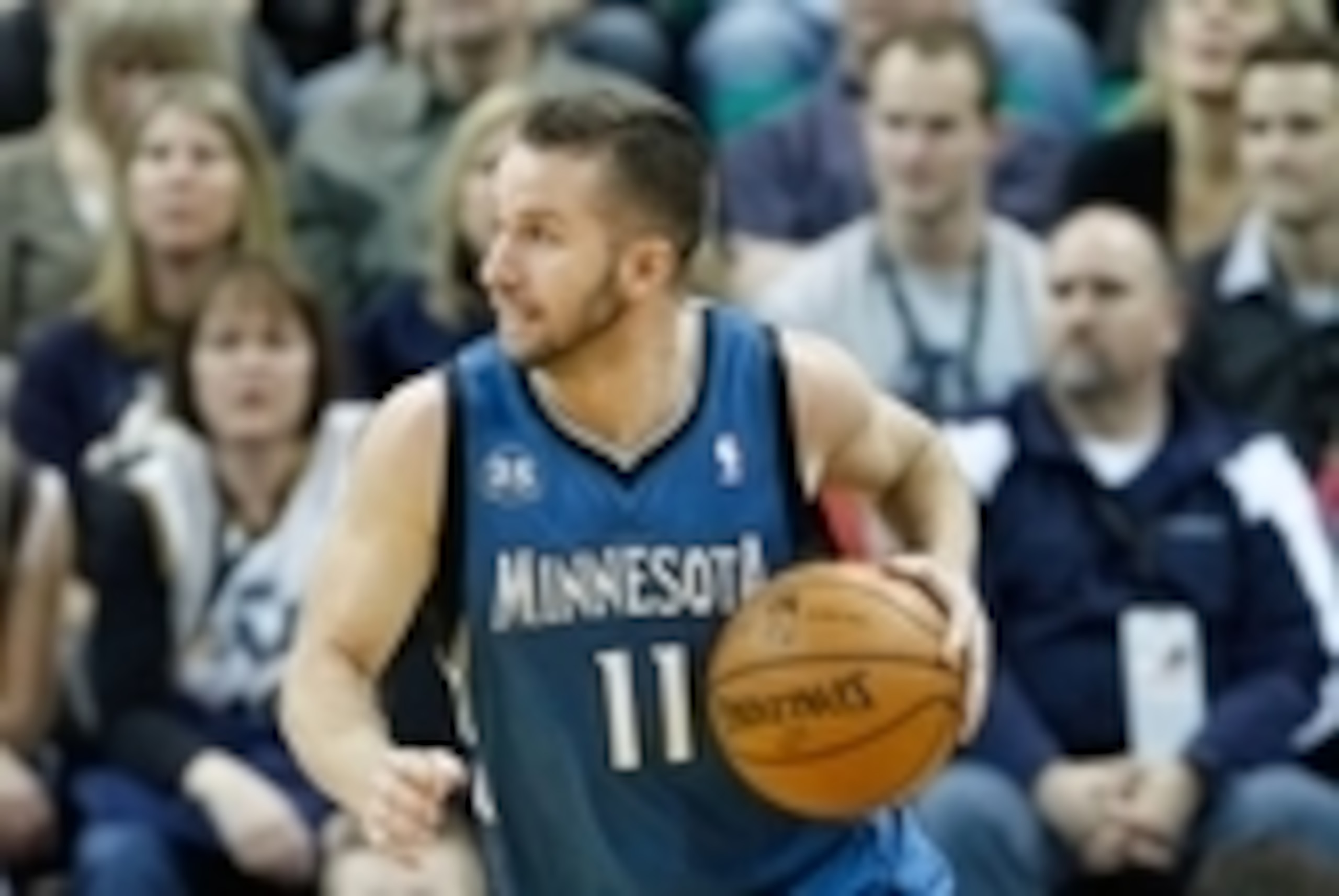 Feb 22, 2014; Salt Lake City, UT, USA; Minnesota Timberwolves point guard J.J. Barea (11) dribbles the ball against the Utah Jazz during the third quarter at EnergySolutions Arena. Minnesota Timberwolves beat the Utah Jazz 121-104.  Mandatory Credit: Chri