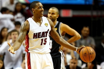 MIAMI, FL - JUNE 12:  Mario Chalmers #15 of the Miami Heat reacts against the San Antonio Spurs during Game Four of the 2014 NBA Finals at American Airlines Arena on June 12, 2014 in Miami, Florida. NOTE TO USER: User expressly acknowledges and agrees tha