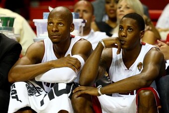 MIAMI, FL - JUNE 10:  Ray Allen #34 and Mario Chalmers #15 of the Miami Heat look on from the bench against the San Antonio Spurs during Game Three of the 2014 NBA Finals at American Airlines Arena on June 10, 2014 in Miami, Florida. NOTE TO USER: User ex