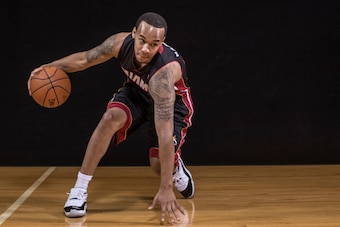 TARRYTOWN, NY - AUGUST 03: Shabazz Napier #13 of the Miami Heat poses for a portrait during the 2014 NBA rookie photo shoot at MSG Training Center on August 3, 2014 in Tarrytown, New York. NOTE TO USER: User expressly acknowledges and agrees that, by down