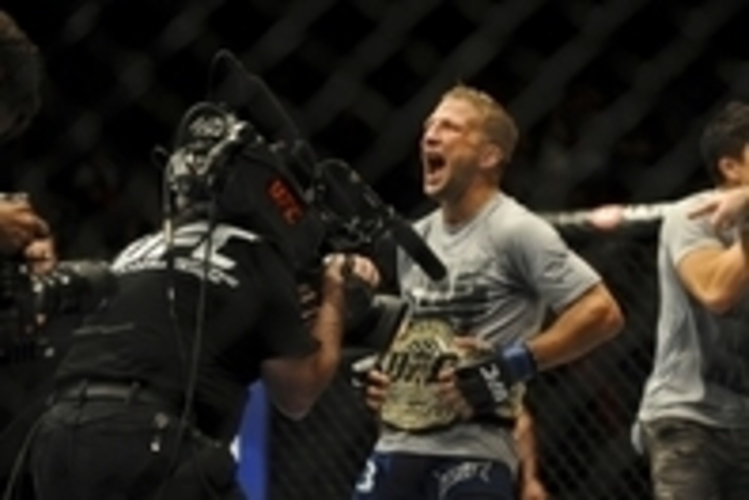 May 24, 2014; Las Vegas, NV, USA; New bantamweight champion TJ Dillashaw celebrates his TKO win over opponent  Renan Barao (not pictured) following their UFC 173 bantamweight championship bout at MGM Grand Garden Arena. Mandatory Credit: Stephen R. Sylvan