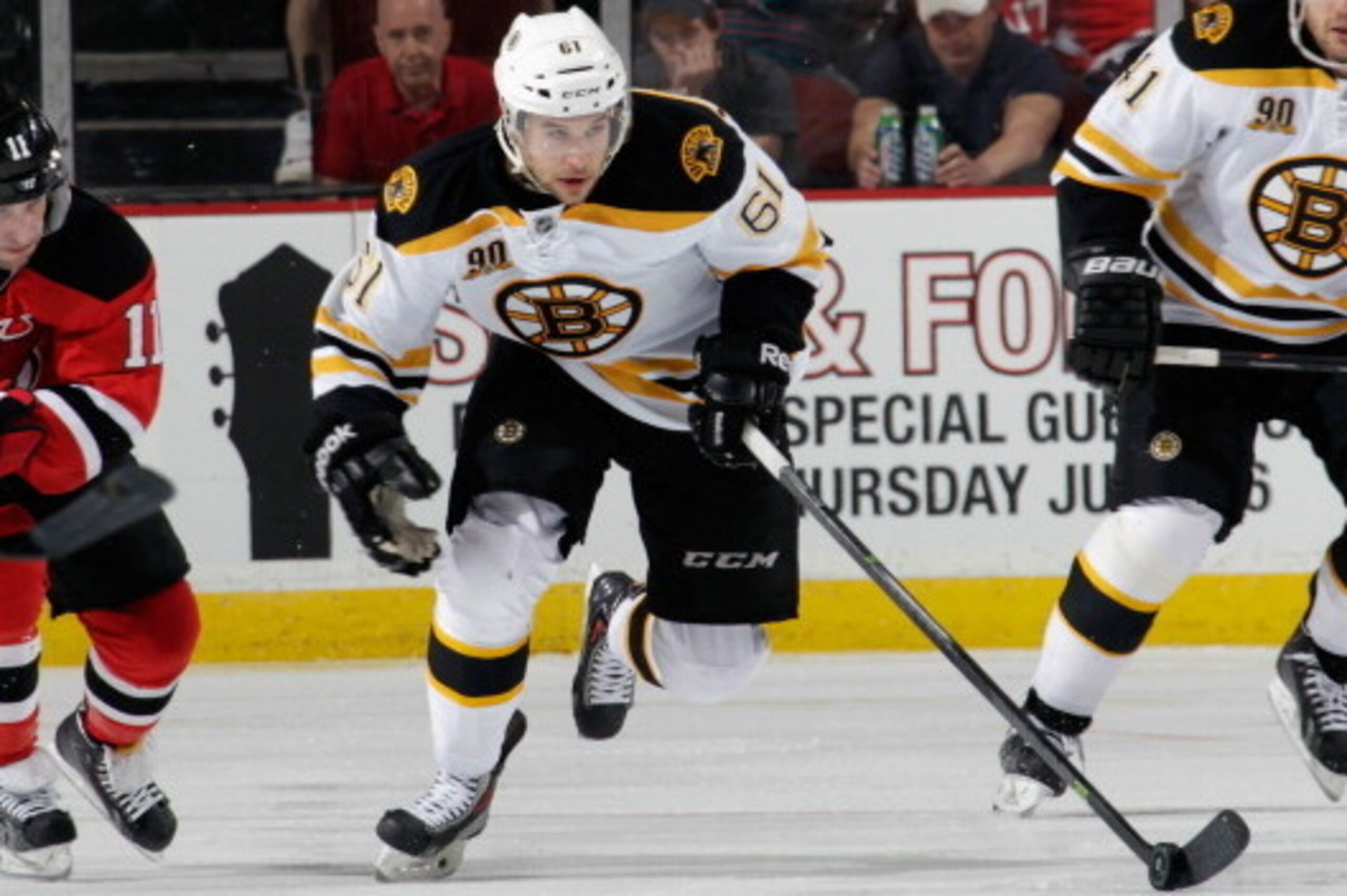NEWARK, NJ - APRIL 13:  Craig Cunningham #61 of the Boston Bruins skates against the New Jersey Devils at the Prudential Center on April 13, 2014 in Newark, New Jersey.  (Photo by Bruce Bennett/Getty Images)