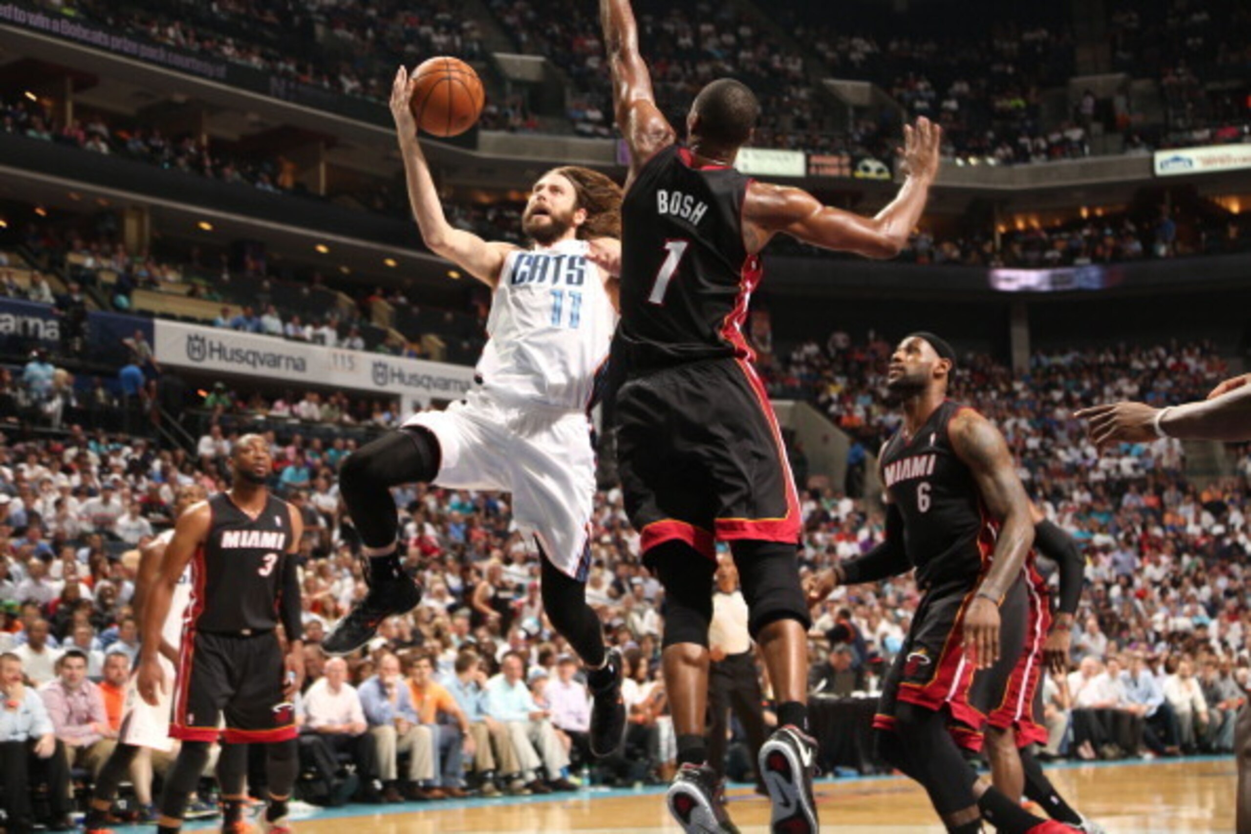 CHARLOTTE, NC - APRIL 28: Josh McRoberts #11 of the Charlotte Bobcats shoots against the Miami Heat in Game Four of the Eastern Conference Quarterfinals in the 2014 NBA Playoffs at the Time Warner Cable Arena on April 28, 2014 in Charlotte, North Carolina