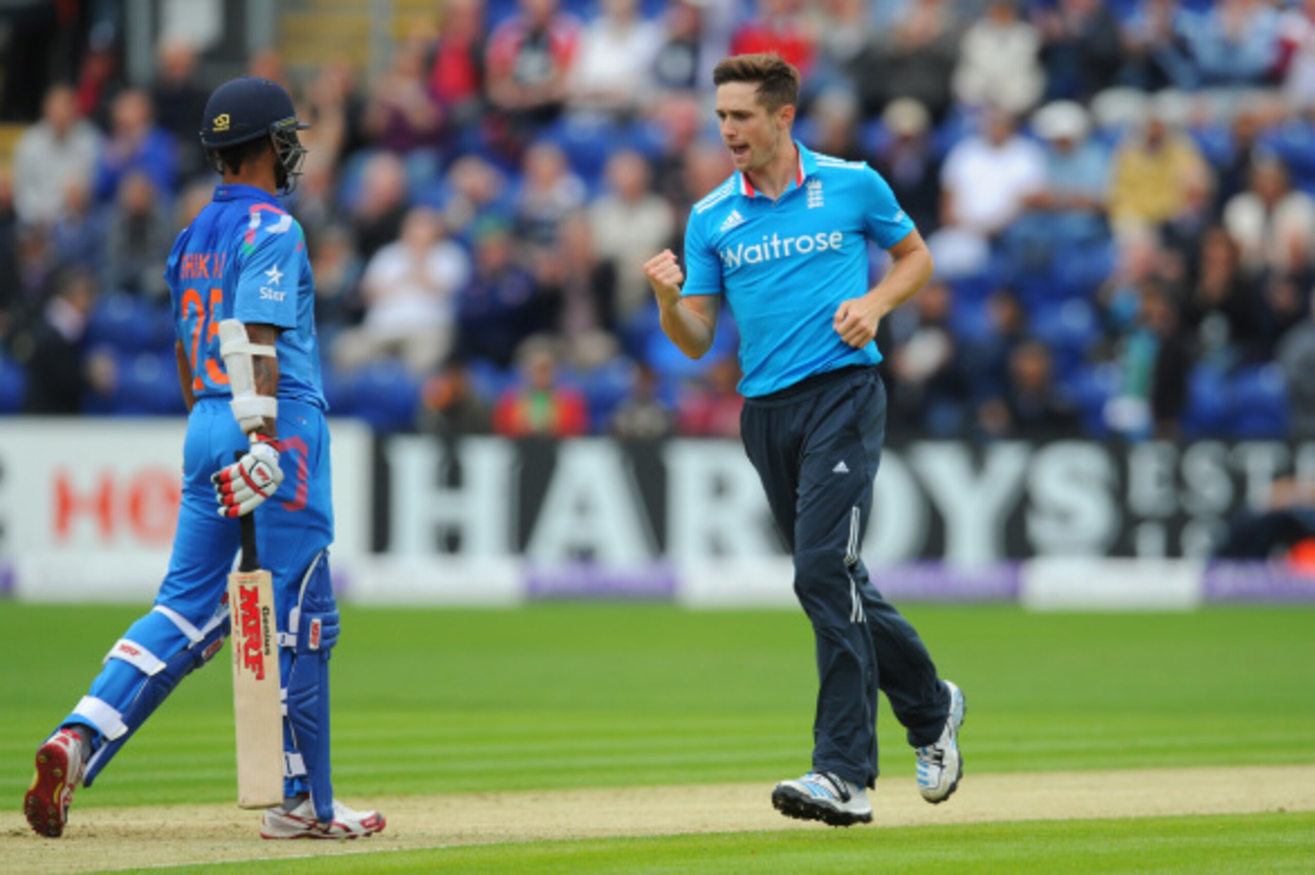 CARDIFF, WALES - AUGUST 27:  England bowler Chris Woakes celebrates after dismissing India batsman Shikhar Dhawan during the 2nd  Royal London One Day International match between England and India at SWALEC Stadium on August 27, 2014 in Cardiff, Wales.  (