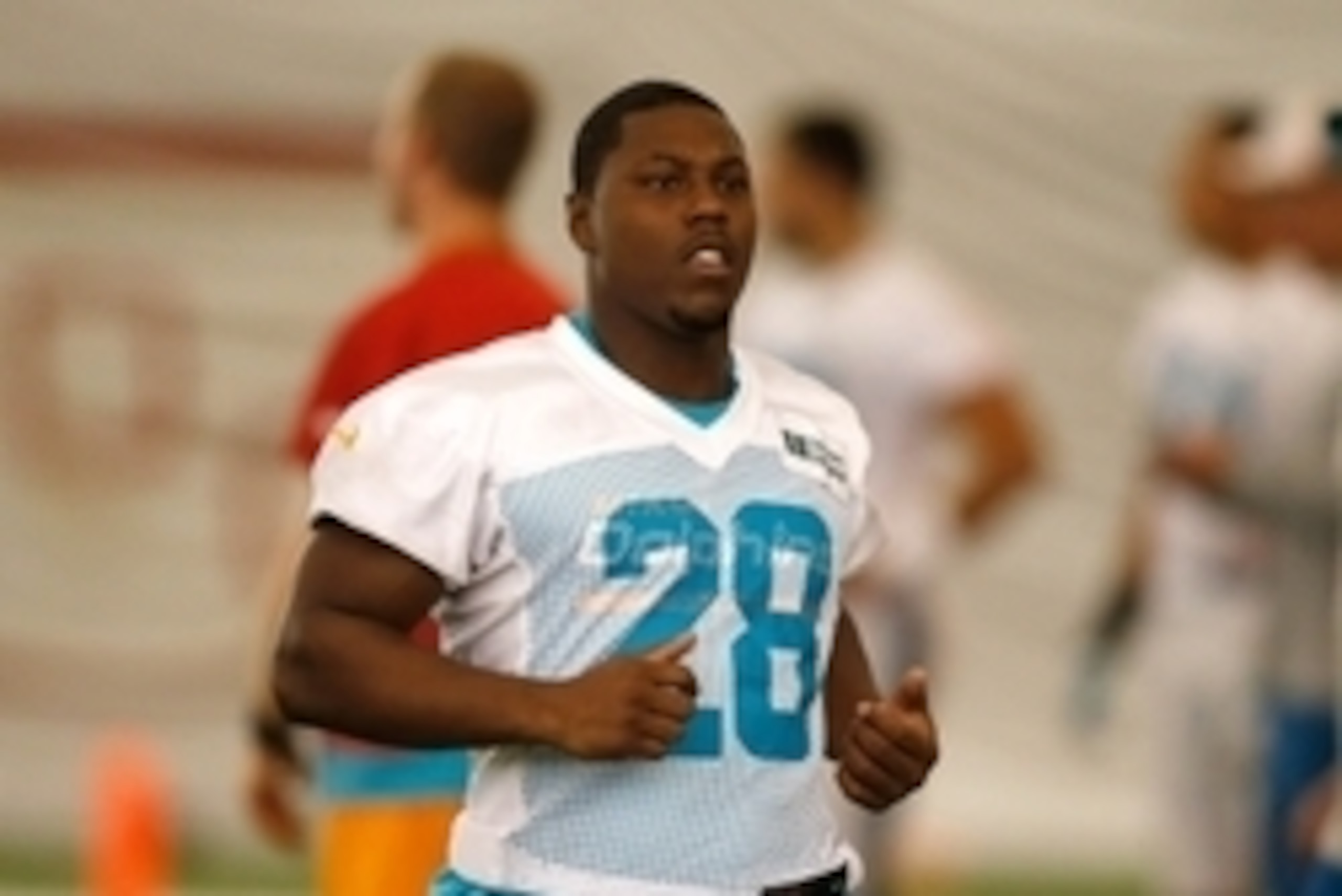 Jun 17, 2014; Davie, FL, USA; Miami Dolphins running back Knowshon Moreno (28) during mini-camp at Miami Dolphins Training Facility. Mandatory Credit: Robert Mayer-USA TODAY Sports Jun 17, 2014; Davie, FL, USA; Miami Dolphins running back Knowshon Moreno (28) during mini-camp at Miami Dolphins Training Facility. Mandatory Credit: Robert Mayer-USA TODAY Sports
