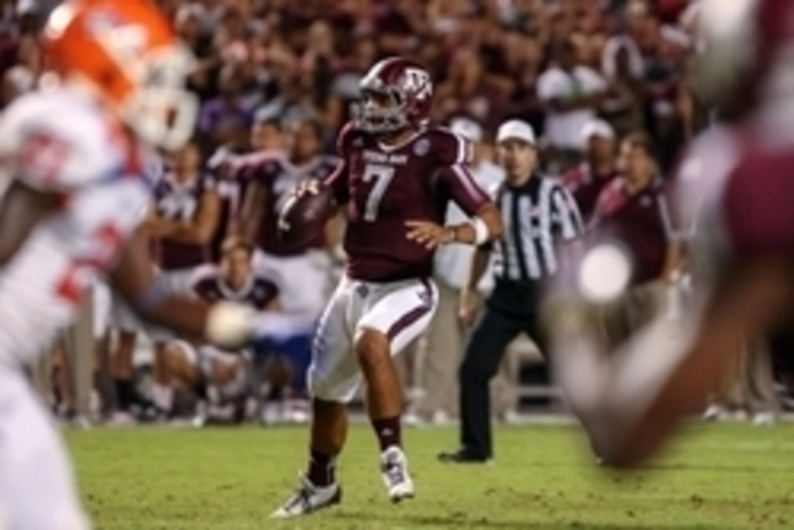 Sep 7, 2013; College Station, TX, USA; Texas A&M Aggies quarterback Kenny Hill (7) looks for an open receiver during the fourth quarter against the Sam Houston State Bearkats at Kyle Field. Mandatory Credit: Troy Taormina-USA TODAY Sports