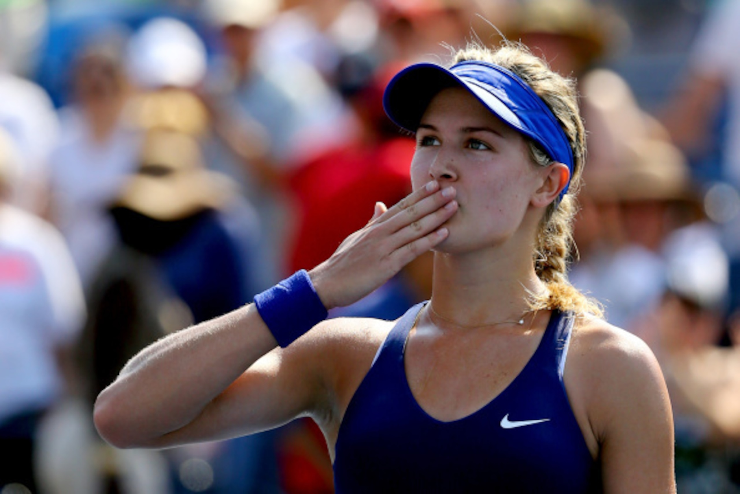 NEW YORK, NY - AUGUST 26: Eugenie Bouchard of Canada reacts after a point against Olga Govortsova of Belarus to win their women's singles first round match on Day Two of the 2014 US Open at the USTA Billie Jean King National Tennis Center on August 26, 2 NEW YORK, NY - AUGUST 26: Eugenie Bouchard of Canada reacts after a point against Olga Govortsova of Belarus to win their women's singles first round match on Day Two of the 2014 US Open at the USTA Billie Jean King National Tennis Center on August 26, 2