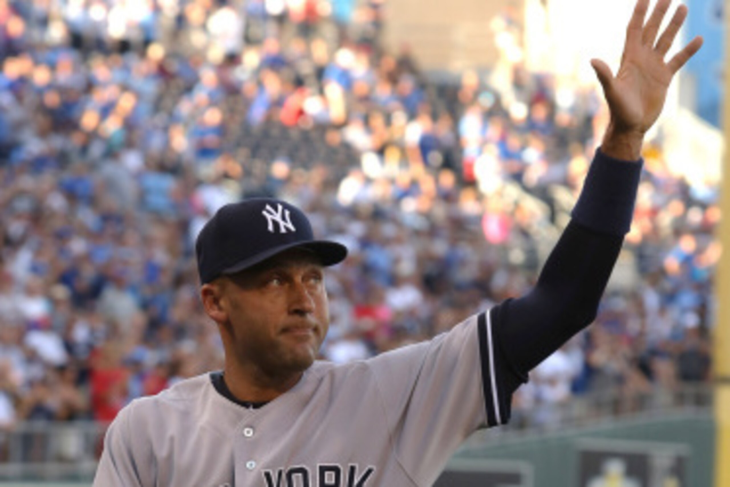 KANSAS CITY, MO - AUGUST 25: Derek Jeter #2 of the New York Yankees waves to the crowd after a farewell ceremony in his honor prior to a game against the Kansas City Royals at Kauffman Stadium on August 25, 2014 in Kansas City, Missouri. (Photo by Ed Zur KANSAS CITY, MO - AUGUST 25: Derek Jeter #2 of the New York Yankees waves to the crowd after a farewell ceremony in his honor prior to a game against the Kansas City Royals at Kauffman Stadium on August 25, 2014 in Kansas City, Missouri. (Photo by Ed Zur