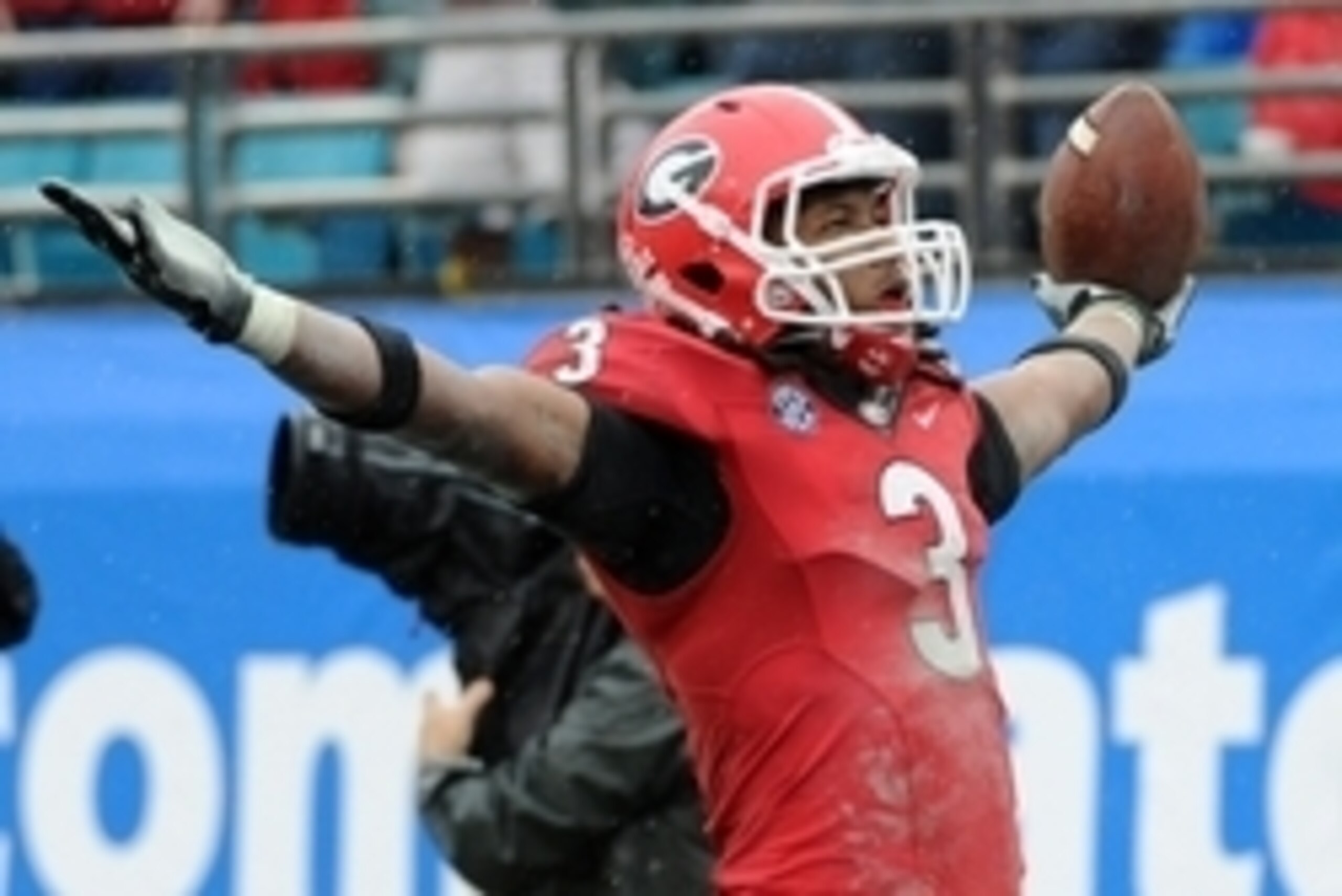 Jan 1, 2014; Jacksonville, FL, USA; Georgia Bulldogs running back Todd Gurley (3) celebrates after a touchdown during the second half of the game against the Nebraska Cornhuskers at EverBank Field . Mandatory Credit: Melina Vastola-USA TODAY Sports
