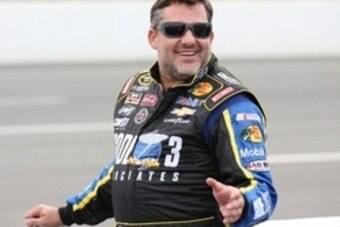 Aug 3, 2014; Long Pond, PA, USA; NASCAR Sprint Cup Series driver Tony Stewart (14) on pit row prior to the GoBowling.com 400 at Pocono Raceway. Mandatory Credit: Bill Streicher-USA TODAY Sports