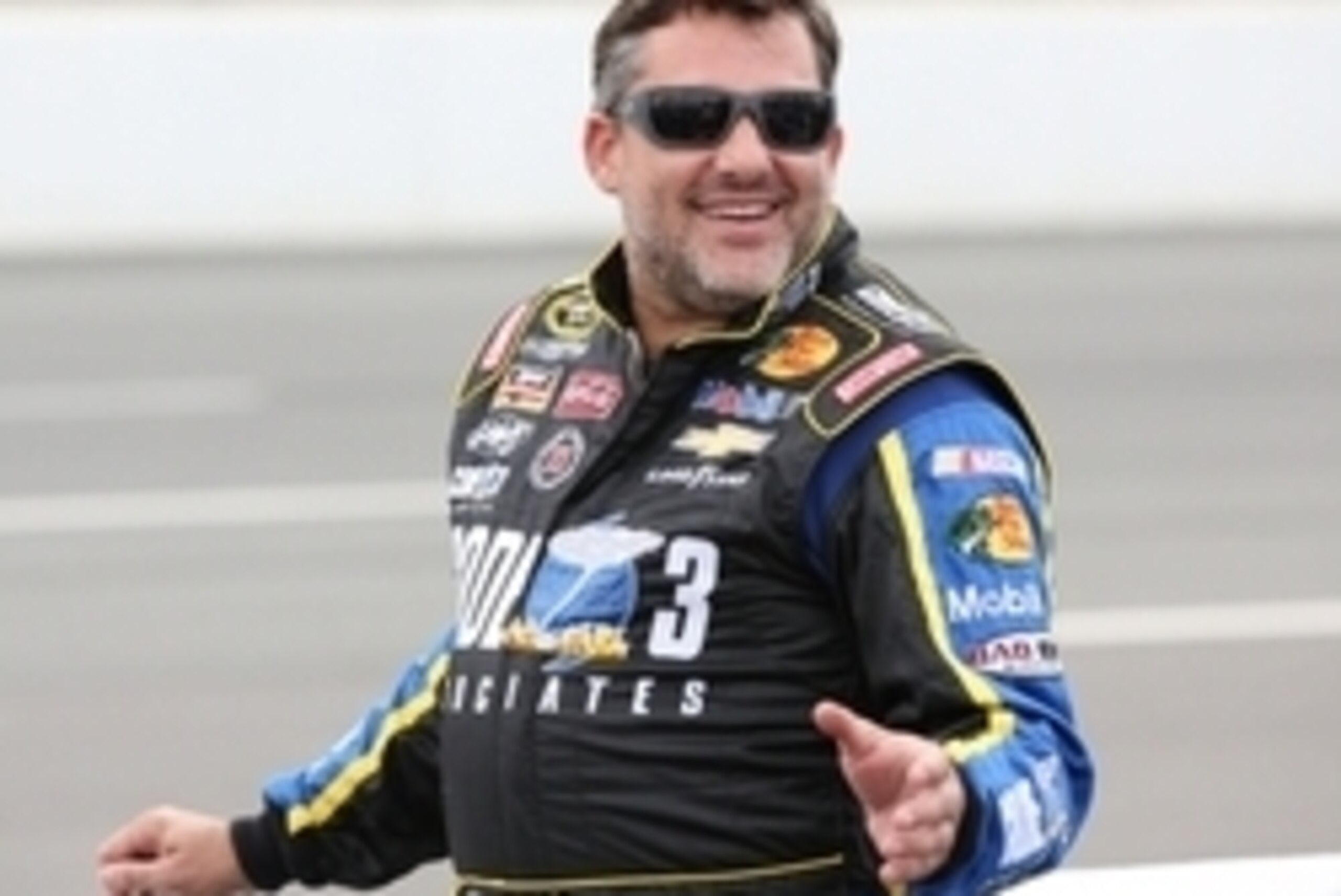 Aug 3, 2014; Long Pond, PA, USA; NASCAR Sprint Cup Series driver Tony Stewart (14) on pit row prior to the GoBowling.com 400 at Pocono Raceway. Mandatory Credit: Bill Streicher-USA TODAY Sports Aug 3, 2014; Long Pond, PA, USA; NASCAR Sprint Cup Series driver Tony Stewart (14) on pit row prior to the GoBowling.com 400 at Pocono Raceway. Mandatory Credit: Bill Streicher-USA TODAY Sports