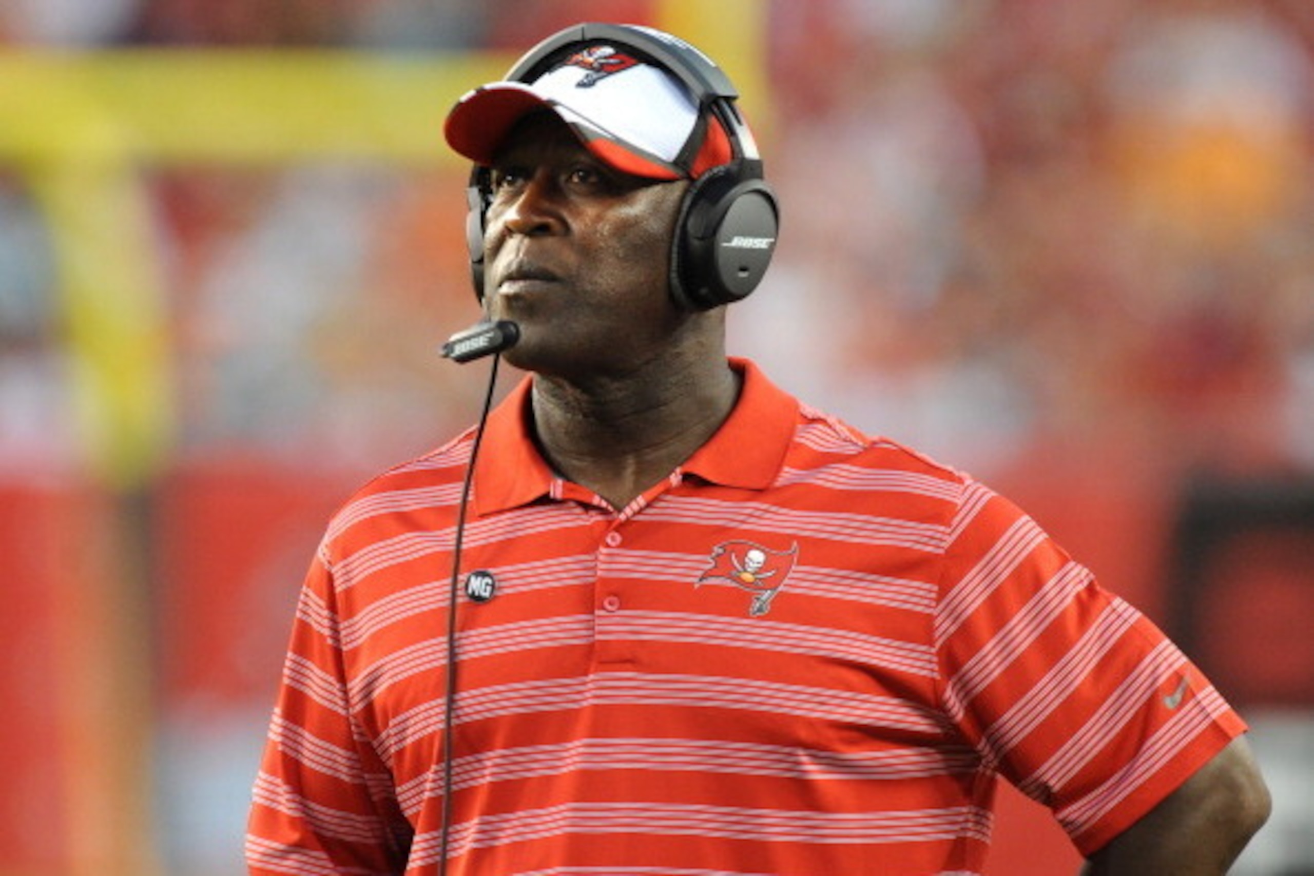 TAMPA, FL - AUGUST 16:  Head coach Lovie Smith of the Tampa Bay Buccaneers looks on from the sideline during the preseason game against the Miami Dolphins at Raymond James Stadium on August 16, 2014 in Tampa, Florida. (Photo by Cliff McBride/Getty Images)
