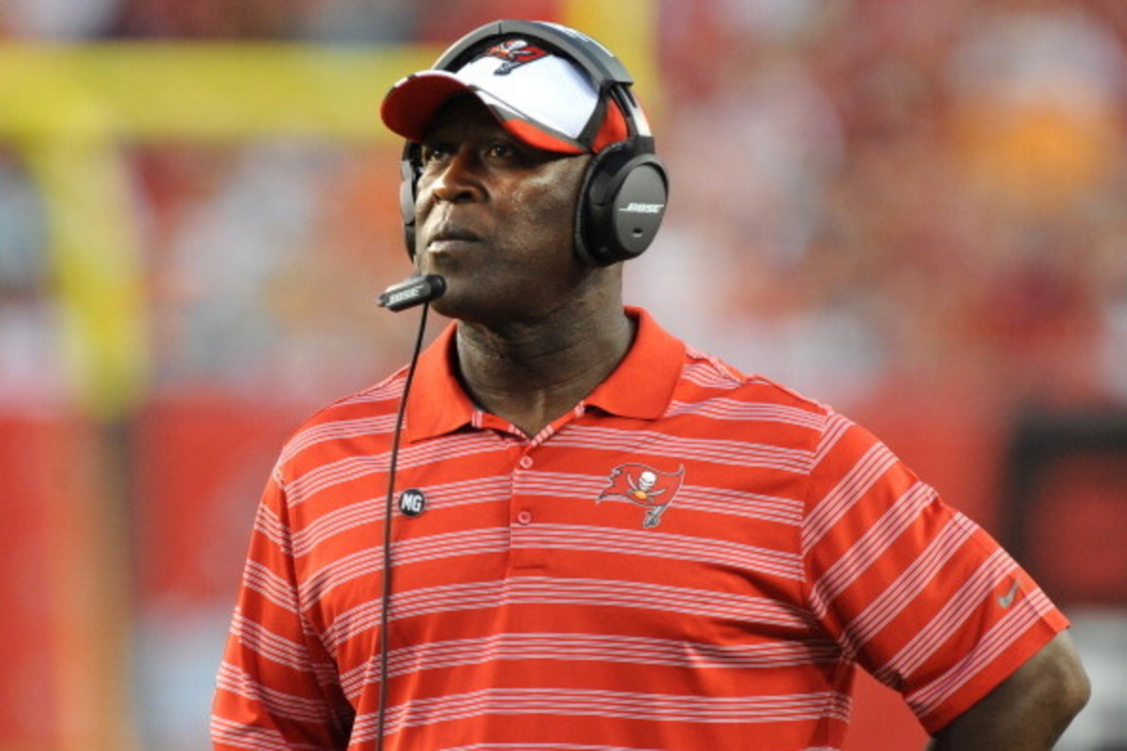 TAMPA, FL - AUGUST 16:  Head coach Lovie Smith of the Tampa Bay Buccaneers looks on from the sideline during the preseason game against the Miami Dolphins at Raymond James Stadium on August 16, 2014 in Tampa, Florida. (Photo by Cliff McBride/Getty Images)