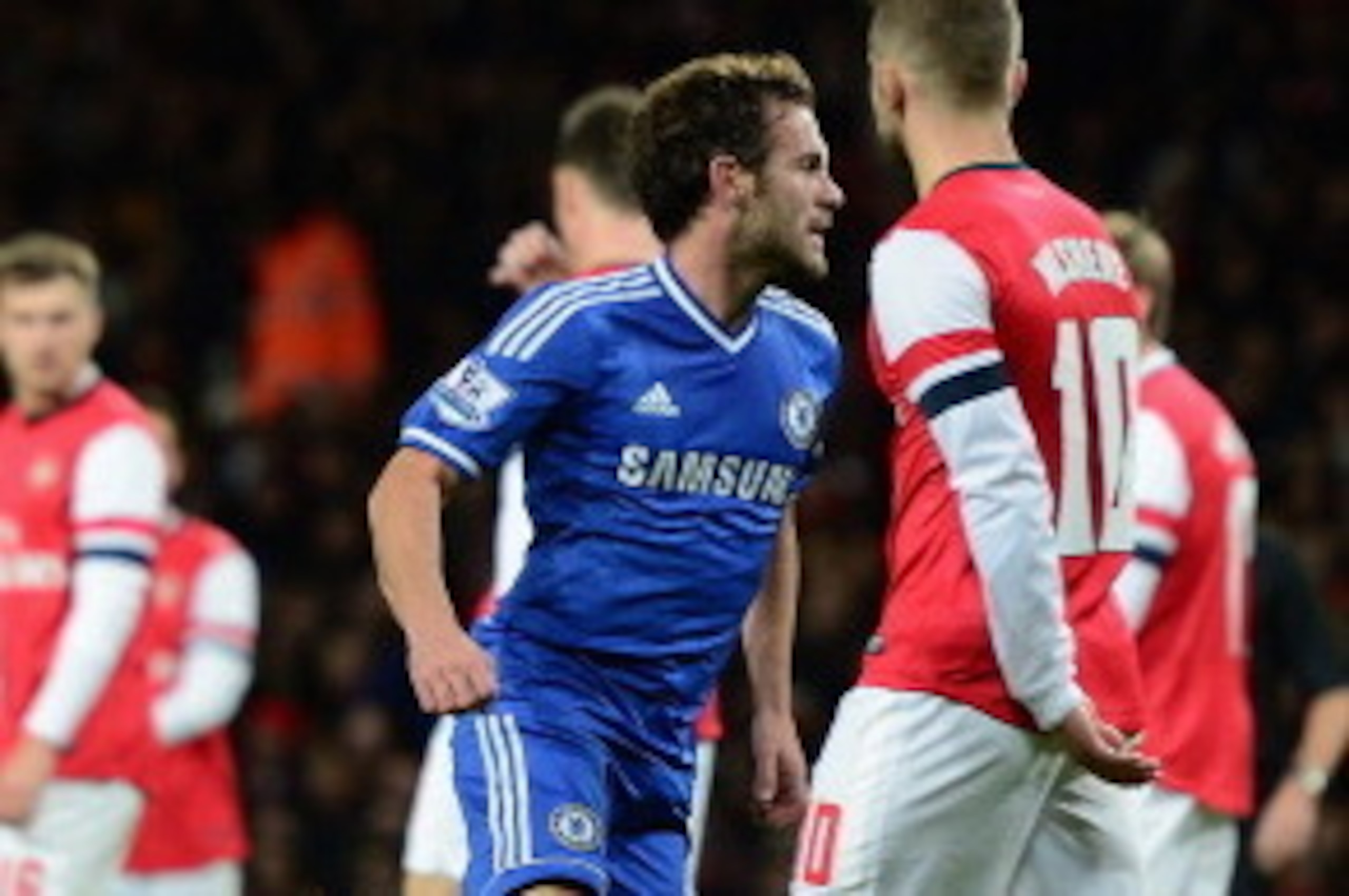 LONDON, ENGLAND - OCTOBER 29:  Juan Mata of Chelsea celebrates after scoring his side's second goal during the Capital One Cup Fourth Round match between Arsenal and Chelsea at the Emirates Stadium on October 29, 2013 in London, England.  (Photo by Jamie 