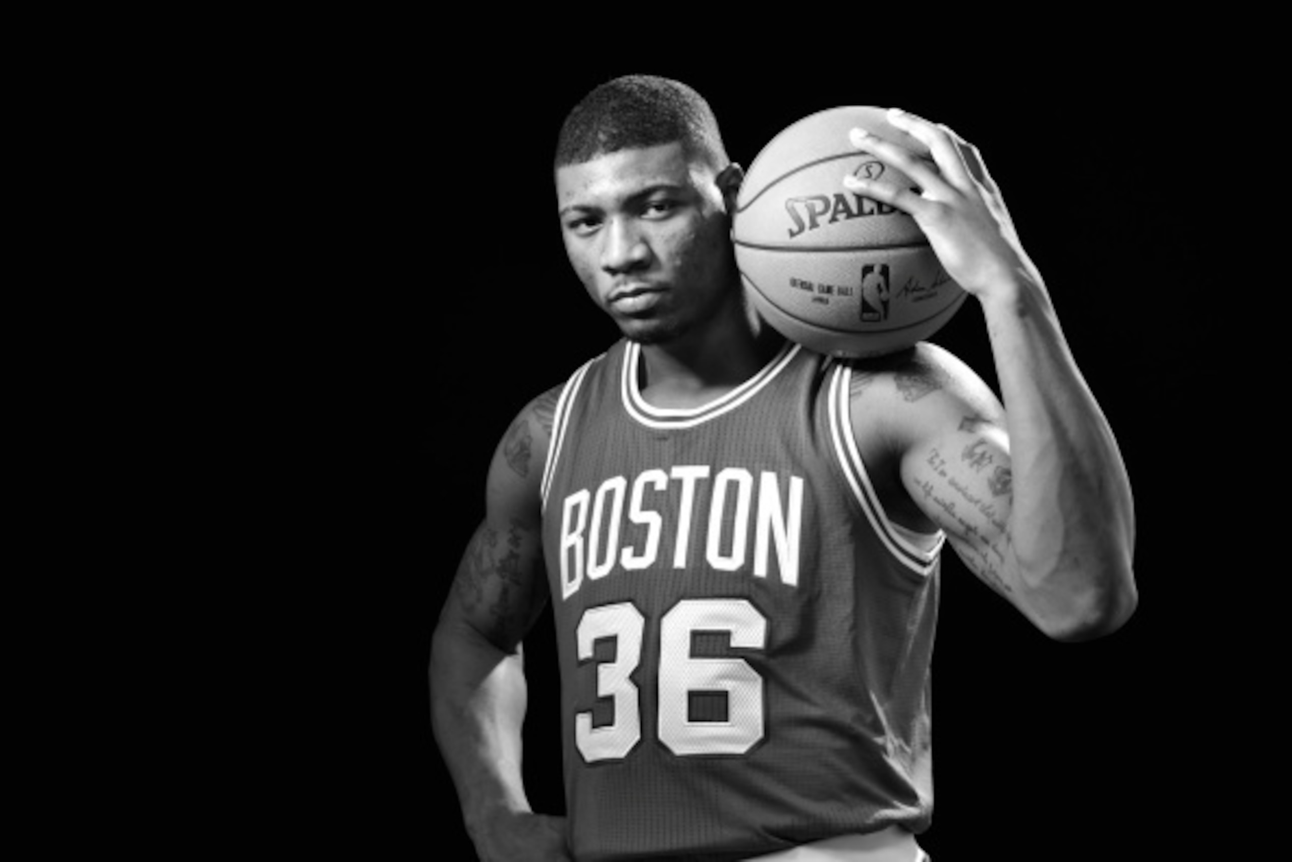 TARRYTOWN, NY - AUGUST 3: Marcus Smart #36 of the Boston Celtics poses for a portrait during the 2014 NBA rookie photo shoot on August 3, 2014 at the Madison Square Garden Training Facility in Tarrytown, New York. NOTE TO USER: User expressly acknowledges