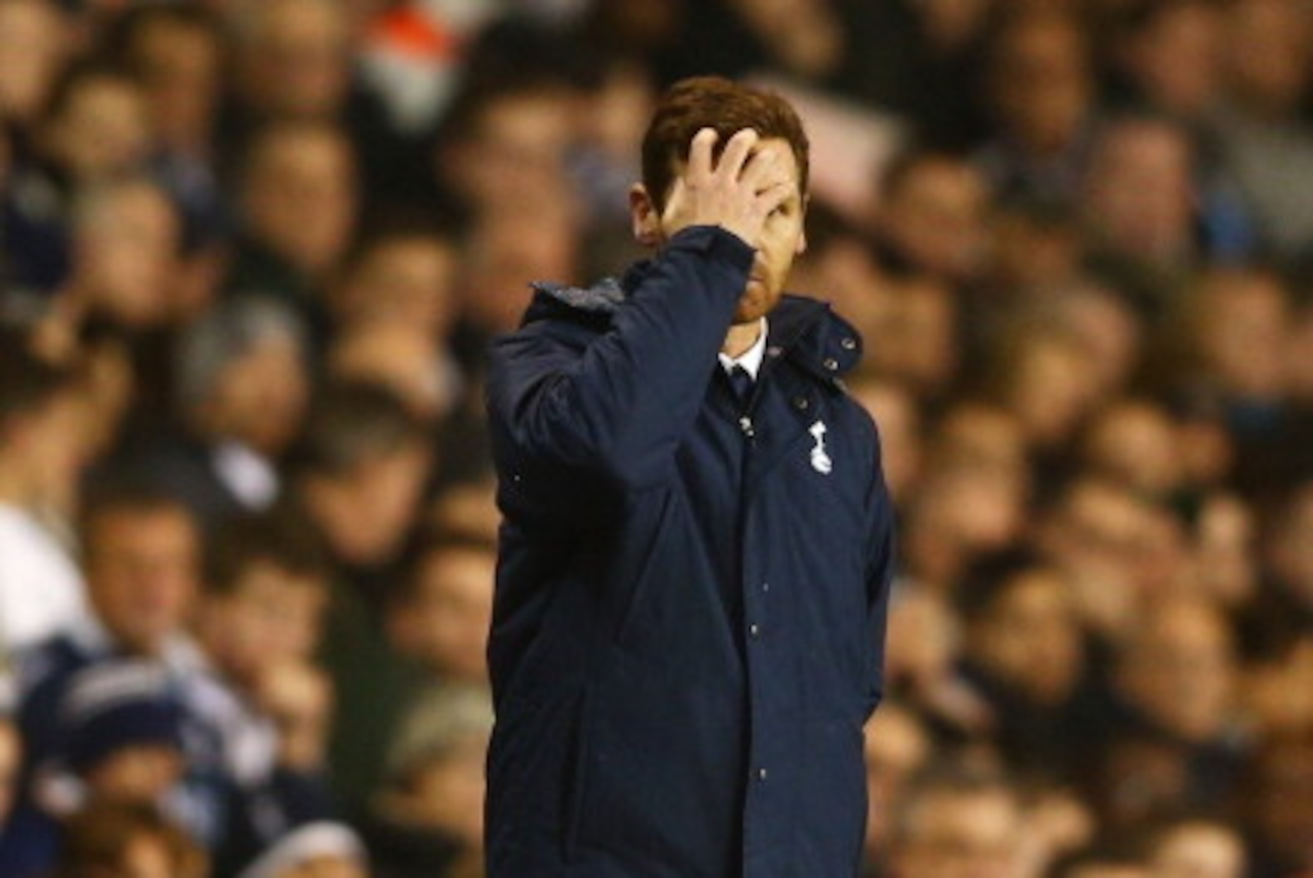 LONDON, ENGLAND - DECEMBER 15:  Andre Villas-Boas manager of Tottenham Hotspur looks through his hands during the Barclays Premier League match between Tottenham Hotspur and Liverpool at White Hart Lane on December 15, 2013 in London, England. (Photo by P