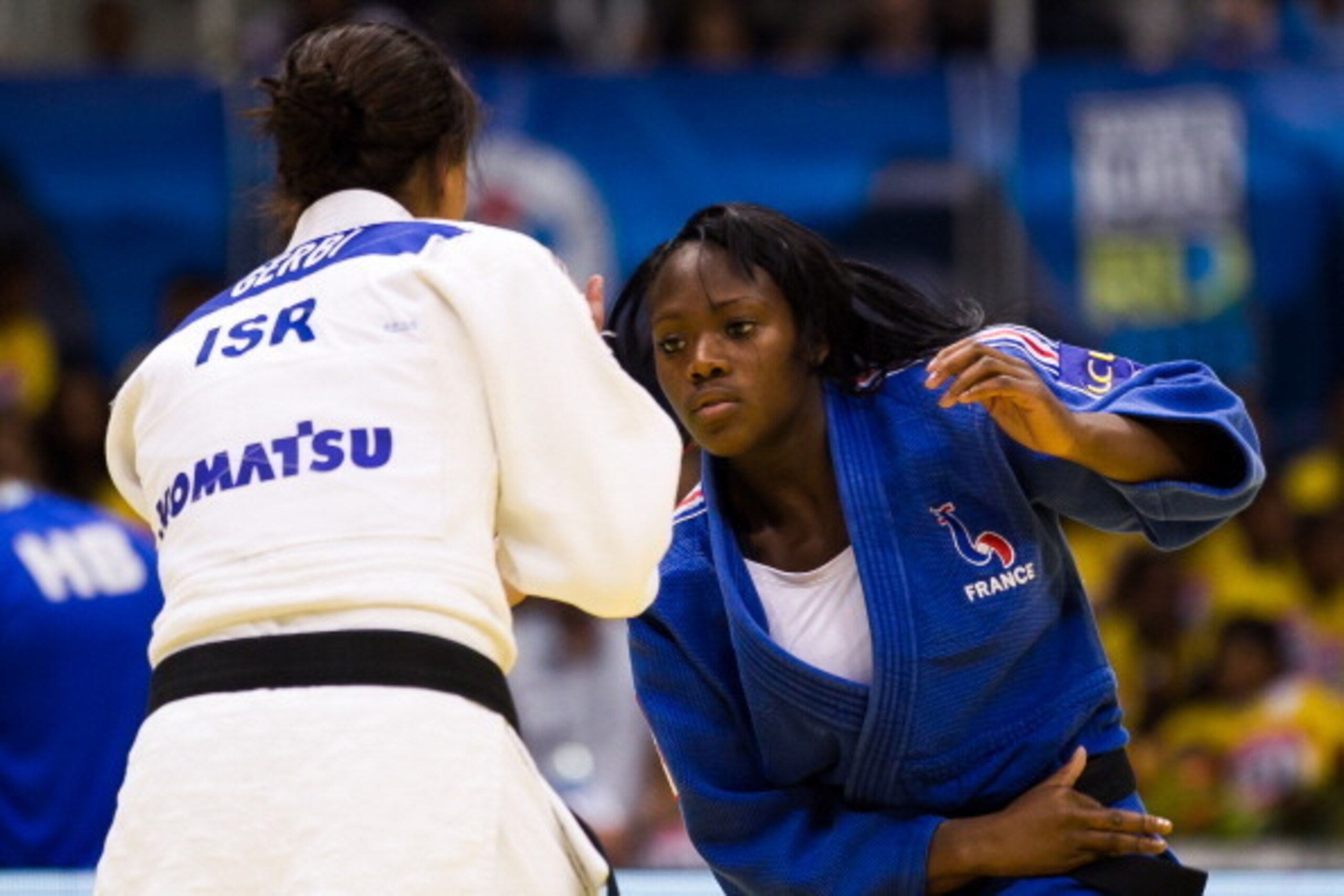 RIO DE JANEIRO, BRAZIL - AUGUST 29: Yarden Gerbi (white) of Israel fights against Clarisse Agbegnenou of France, in the final -63 kg category during the World Judo Championships at Gymnasium Maracanazinho on August 29, 2013 in Rio de Janeiro, Brazil.(Phot
