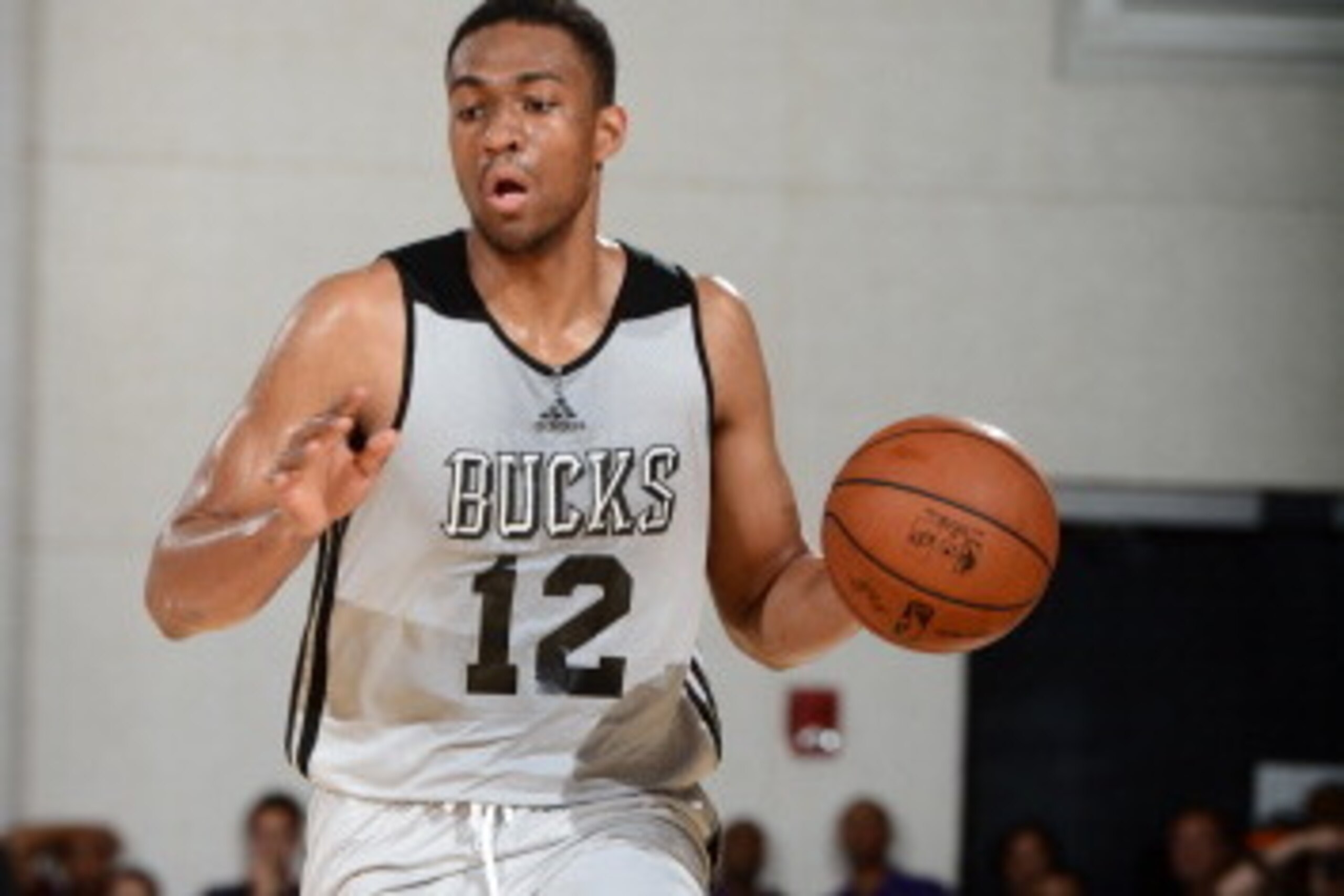 LAS VEGAS, NV - JULY 11: Jabari Parker #12 of the Milwaukee Bucks drives against the Cleveland Cavaliers at the Samsung NBA Summer League 2014 on July 11, 2014 at the Cox Pavilion in Las Vegas, Nevada. NOTE TO USER: User expressly acknowledges and agrees LAS VEGAS, NV - JULY 11: Jabari Parker #12 of the Milwaukee Bucks drives against the Cleveland Cavaliers at the Samsung NBA Summer League 2014 on July 11, 2014 at the Cox Pavilion in Las Vegas, Nevada. NOTE TO USER: User expressly acknowledges and agrees