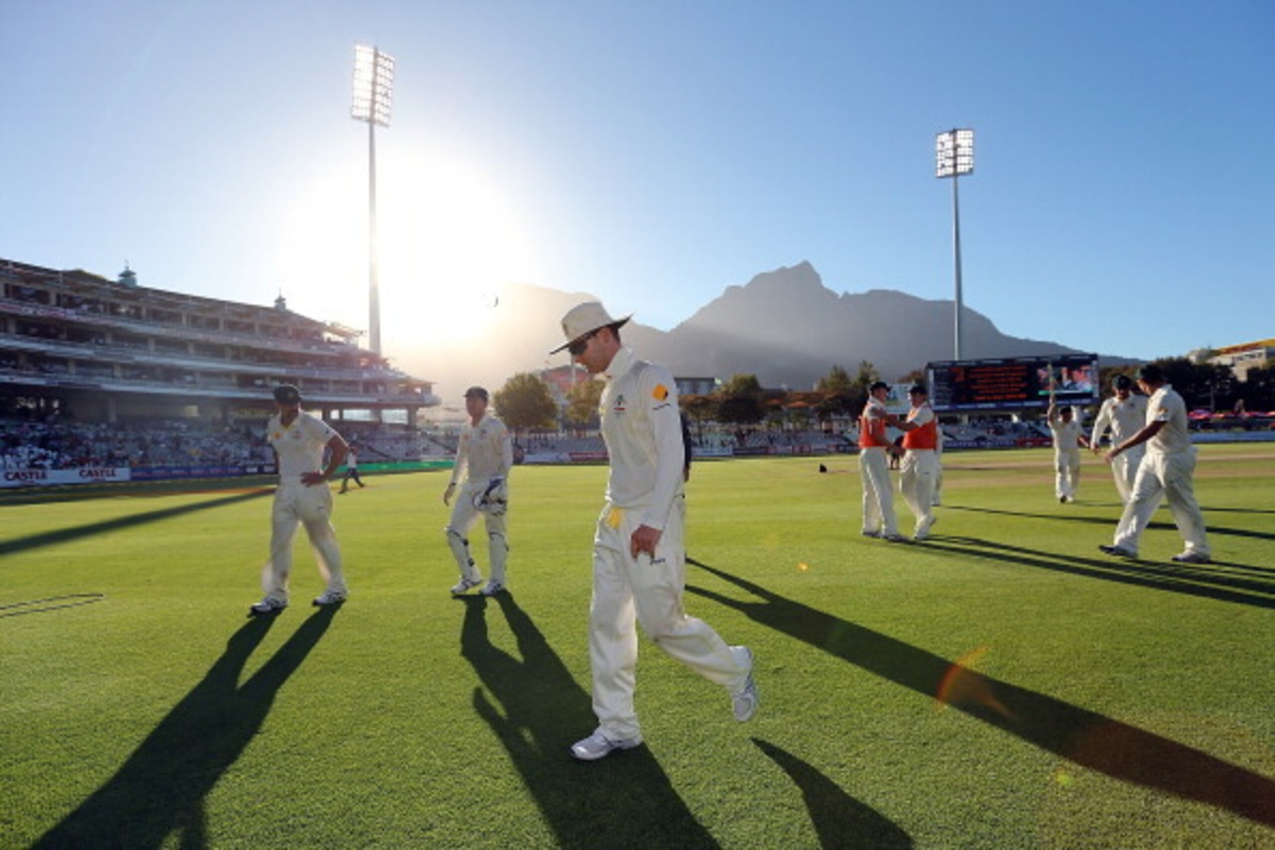 CAPE TOWN, SOUTH AFRICA - MARCH 05: Michael Clarke of Australia leads his team from the field after winning the game during day 5 of the third test match between South Africa and Australia at Sahara Park Newlands on March 5, 2014 in Cape Town, South Afric CAPE TOWN, SOUTH AFRICA - MARCH 05: Michael Clarke of Australia leads his team from the field after winning the game during day 5 of the third test match between South Africa and Australia at Sahara Park Newlands on March 5, 2014 in Cape Town, South Afric