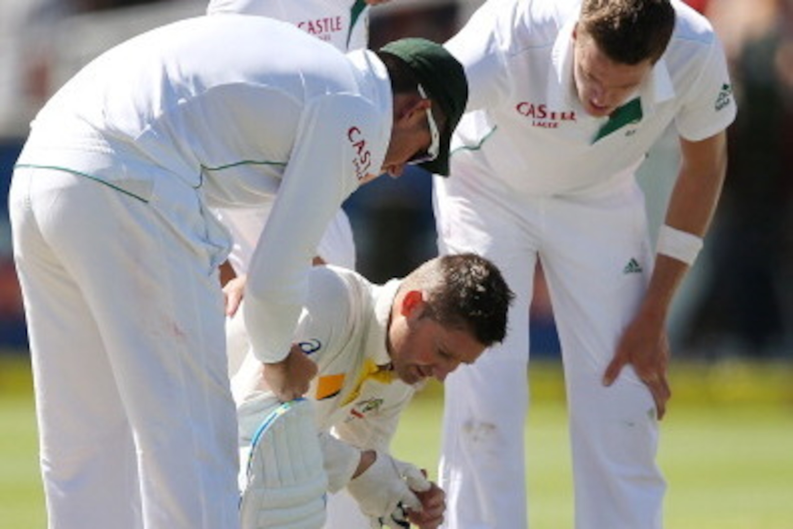 CAPE TOWN, SOUTH AFRICA - MARCH 01: Michael Clarke of Australia goes down after getting hit by a delivery from Morne Morkel of South Africa during day one of the third test match between South Africa and Australia at Newlands cricket ground on March 1, 2 CAPE TOWN, SOUTH AFRICA - MARCH 01: Michael Clarke of Australia goes down after getting hit by a delivery from Morne Morkel of South Africa during day one of the third test match between South Africa and Australia at Newlands cricket ground on March 1, 2