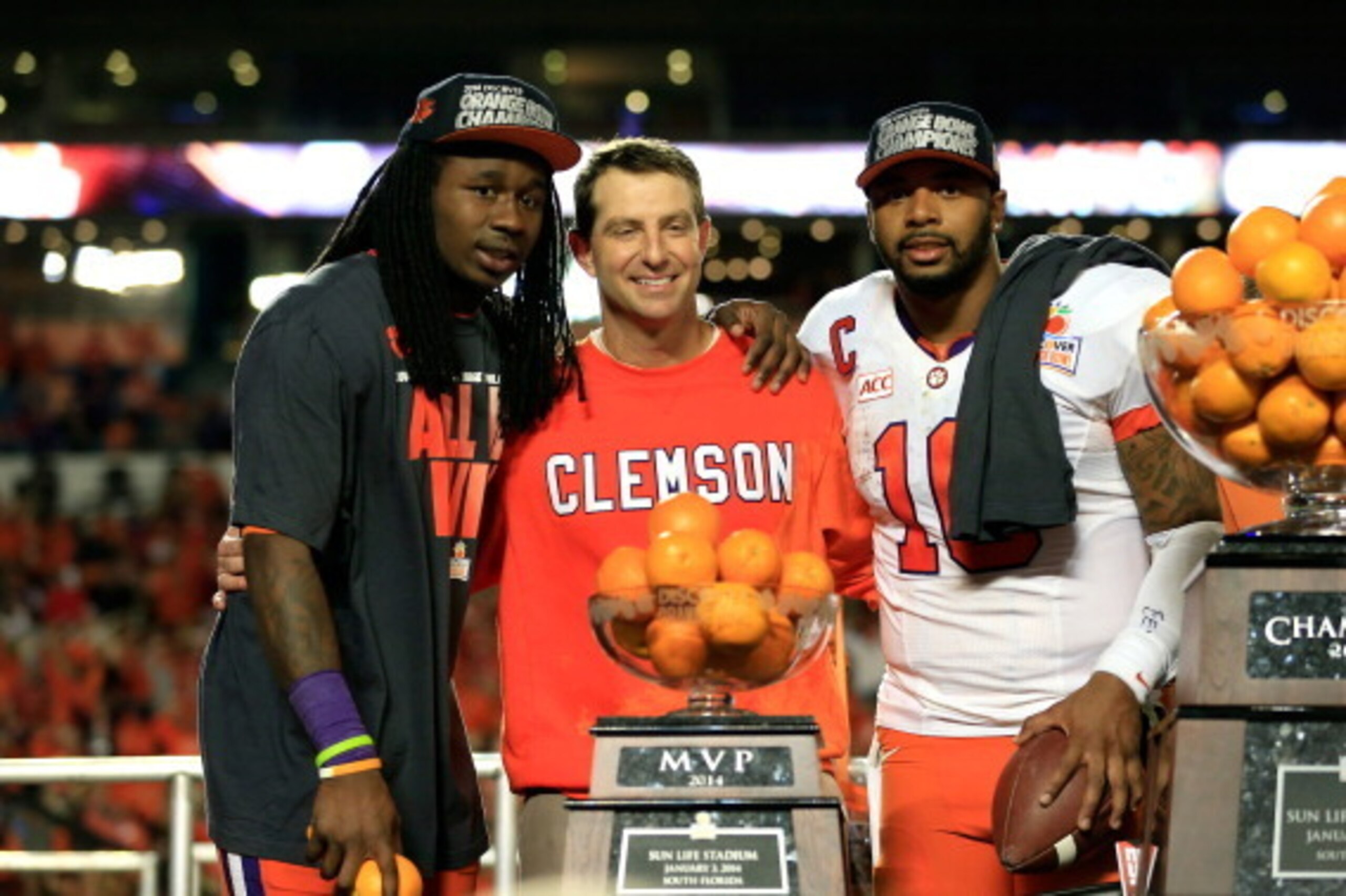 MIAMI GARDENS, FL - JANUARY 03:  (L-R) Sammy Watkins #2, head coach Dabo Swinney and Tajh Boyd #10 of the Clemson Tigers celebrate after defeating the Ohio State Buckeyes during the Discover Orange Bowl at Sun Life Stadium on January 3, 2014 in Miami Gard