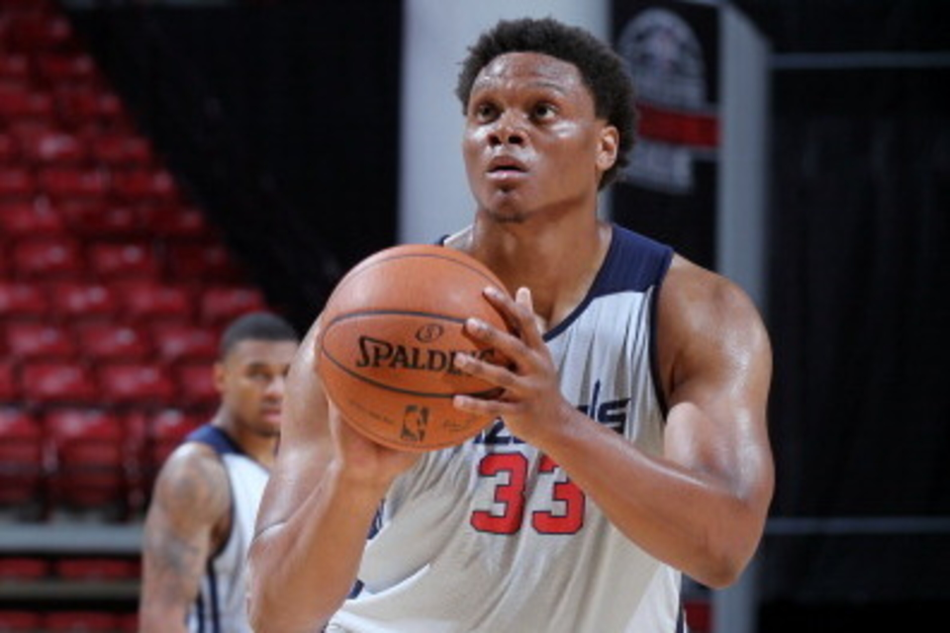 LAS VEGAS, NV - JULY 12: Daniel Orton #33 of the Washington Wizards attempts a free throw against the Atlanta Hawks at the Samsung NBA Summer League 2014 on July 12, 2014 at the Thomas & Mack Center in Las Vegas, Nevada. NOTE TO USER: User expressly ackno