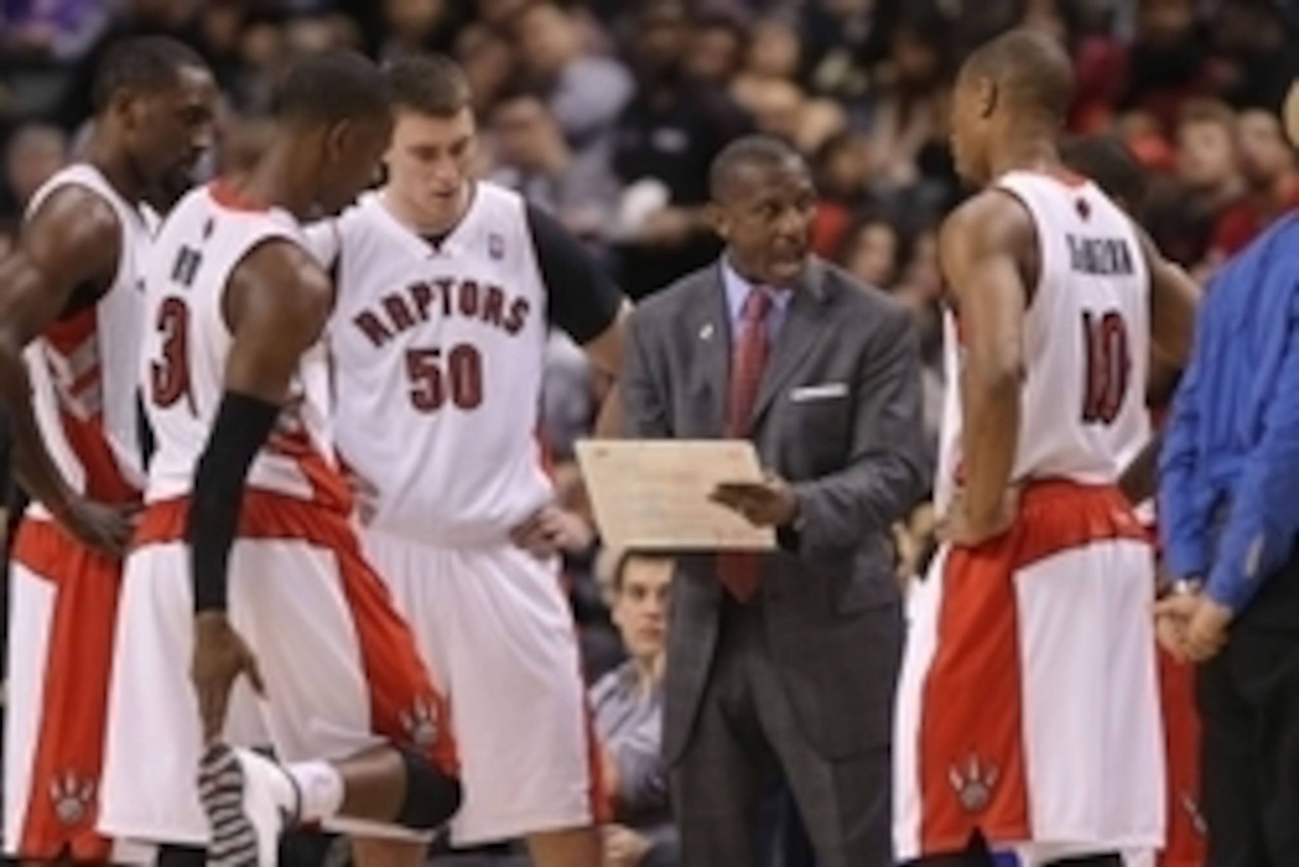 Dec 13, 2013; Toronto, Ontario, CAN; Toronto Raptors head coach Dwane Casey talks to guard DeMar DeRozan (10) and forward Tyler Hansbrough (50) and guard Terrence Ross (31) against the Philadelphia 76ers at Air Canada Centre. The Raptors beat the 76ers 10 Dec 13, 2013; Toronto, Ontario, CAN; Toronto Raptors head coach Dwane Casey talks to guard DeMar DeRozan (10) and forward Tyler Hansbrough (50) and guard Terrence Ross (31) against the Philadelphia 76ers at Air Canada Centre. The Raptors beat the 76ers 10