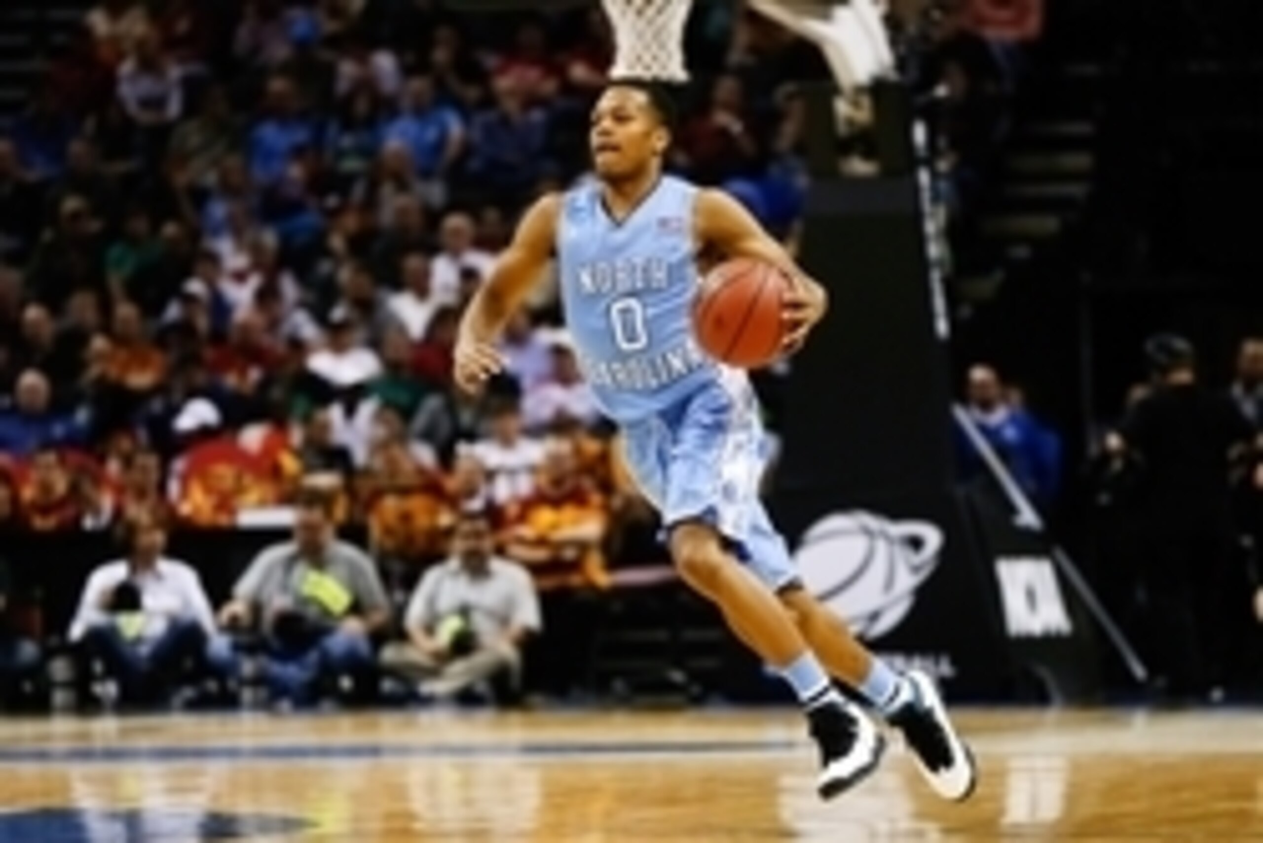 Mar 23, 2014; San Antonio, TX, USA; North Carolina Tar Heels guard Nate Britt (0) dribbles during the game against the Iowa State Cyclones in the third round of the 2014 NCAA Tournament at AT&T Center. Mandatory Credit: Kevin Jairaj-USA TODAY Sports