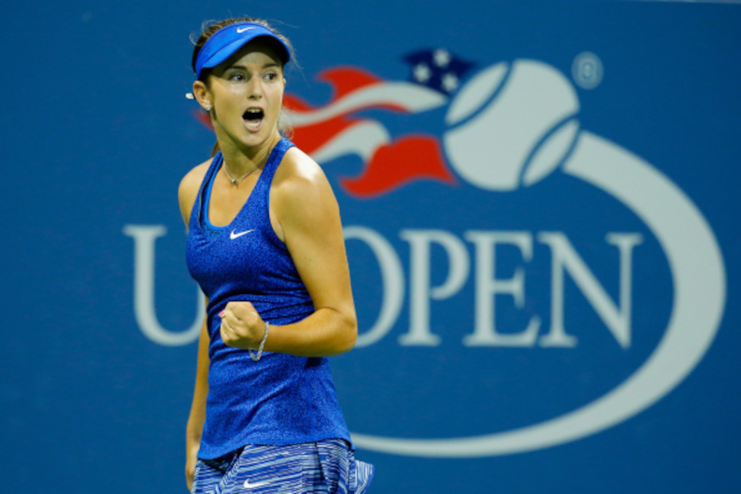 NEW YORK, NY - AUGUST 28:  Catherine 'CiCi' Bellis of the United States reacts against Zarina Diyas of Kazakhstan during their women's singles second round match on Day Four of the 2014 US Open at the USTA Billie Jean King National Tennis Center on August