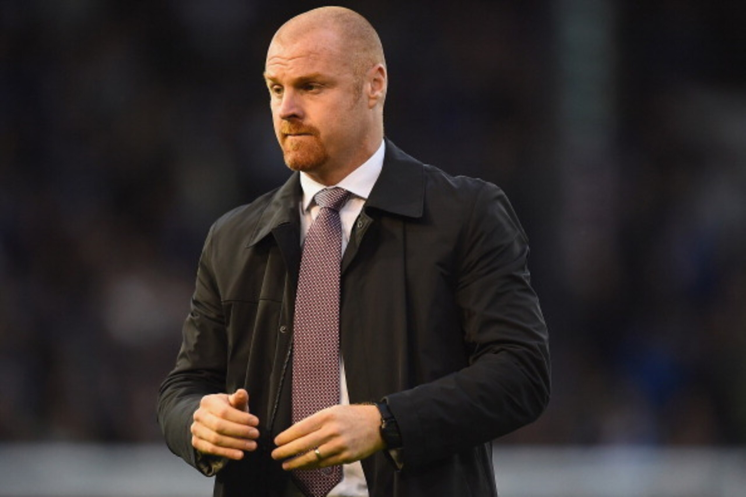 BURNLEY, ENGLAND - AUGUST 18:  Manager Sean Dyche of Burnley looks on during the Barclays Premier League match between Burnley and Chelsea at Turf Moor on August 18, 2014 in Burnley, England.  (Photo by Laurence Griffiths/Getty Images)