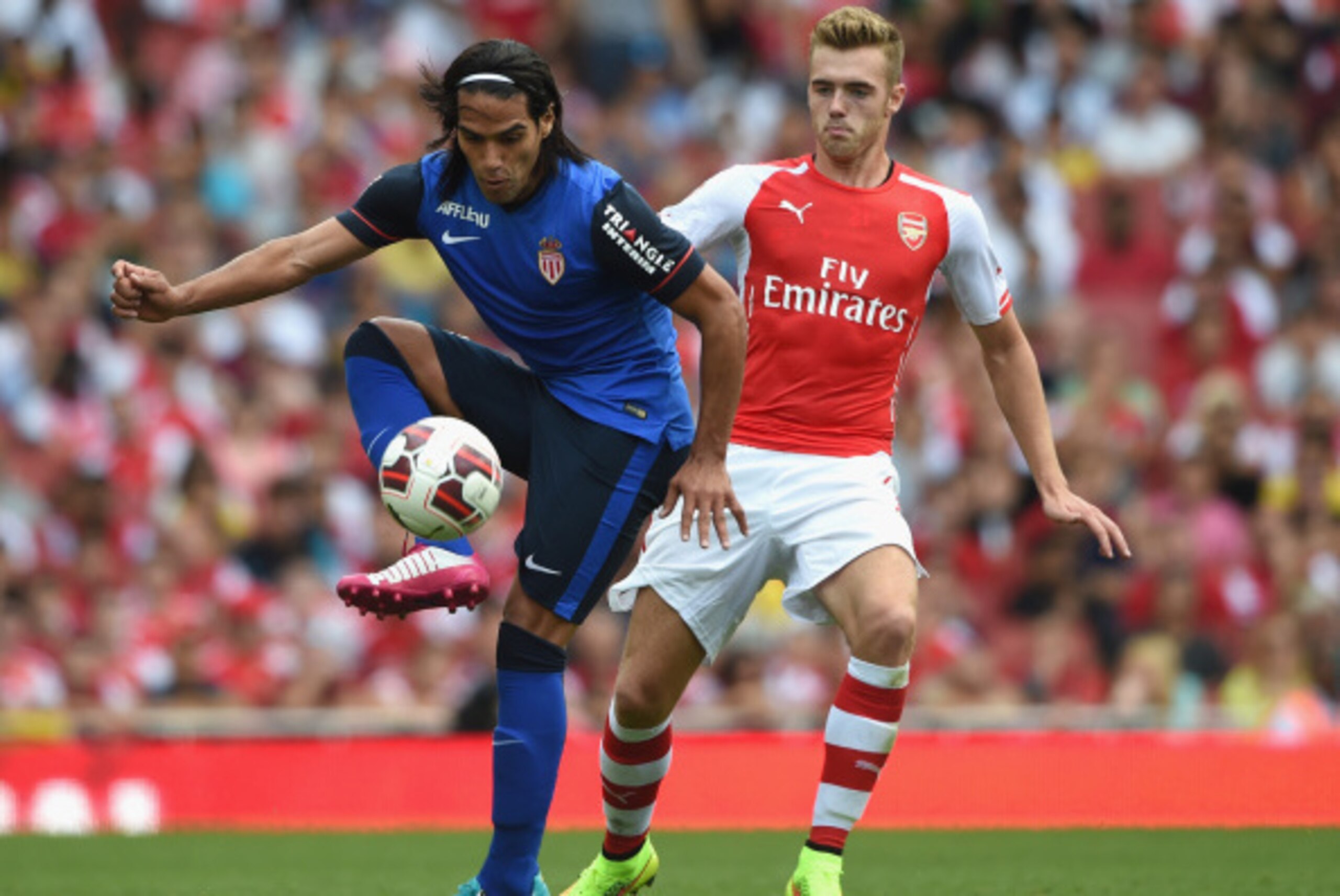 LONDON, ENGLAND - AUGUST 03:  Radamel Falcao of Monaco in action with Calum Chambers during the Emirates Cup match between Arsenal and AS Monaco at the Emirates Stadium on August 3, 2014 in London, England.  (Photo by Michael Regan/Getty Images)