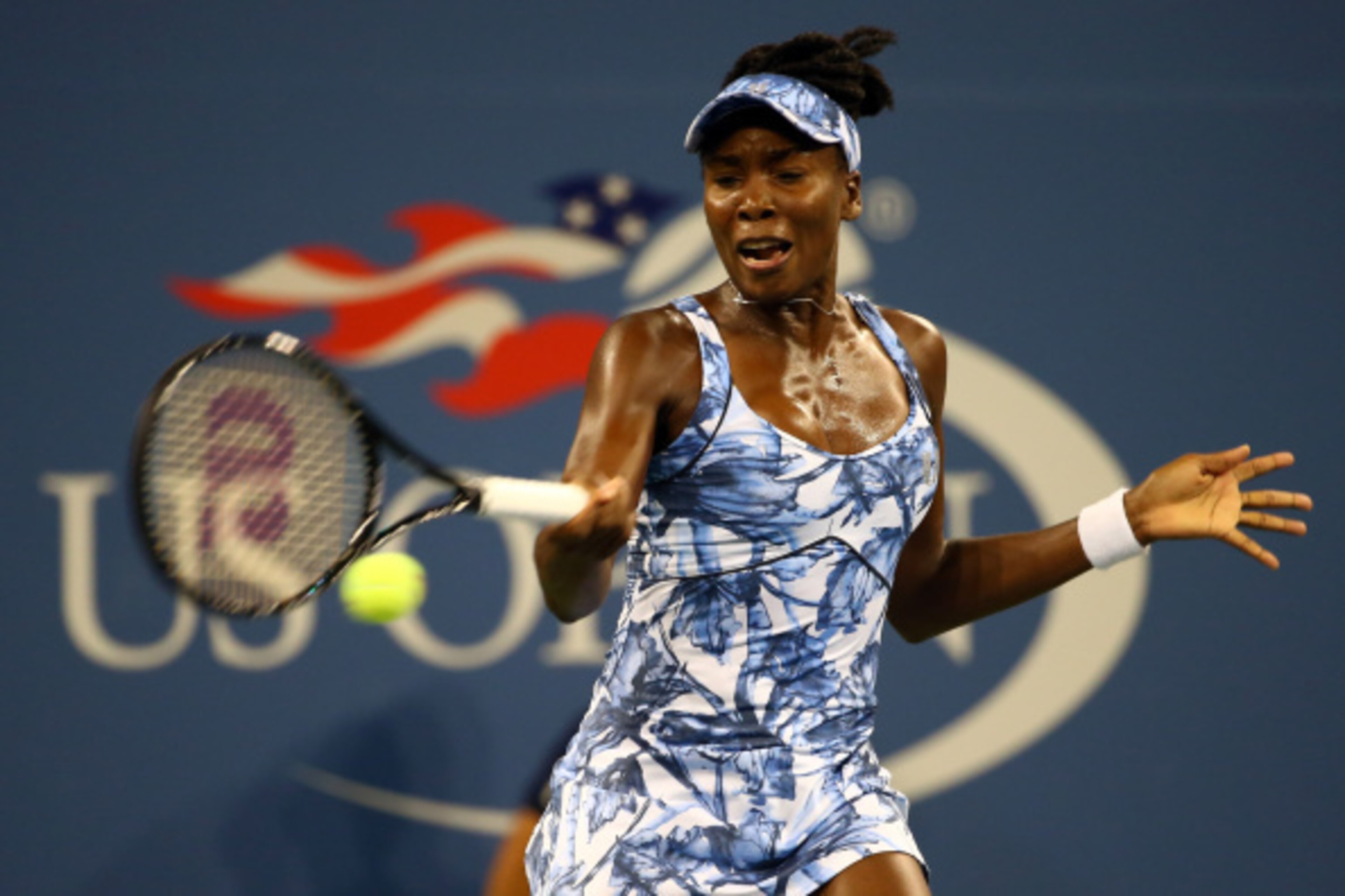 NEW YORK, NY - AUGUST 27:  Venus Williams of the United States returns a shot against Timea Bacsinszky of Switzerland during their women's singles secound round match on Day Three of the 2014 US Open at the USTA Billie Jean King National Tennis Center on 