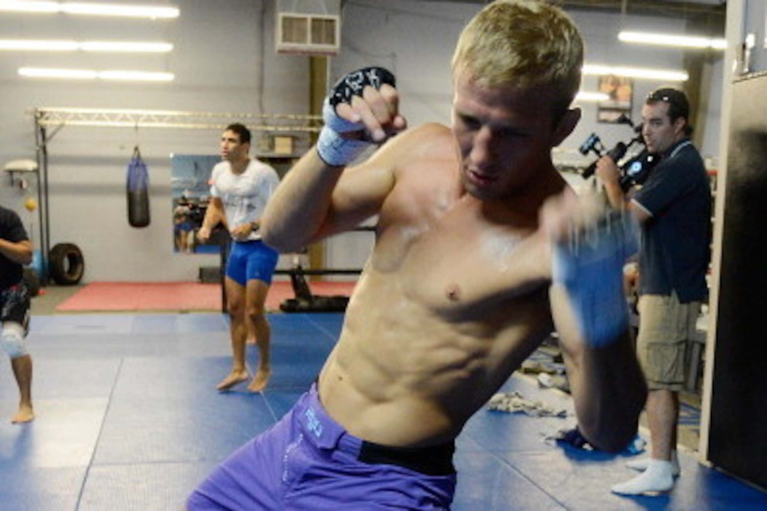 SACRAMENTO, CA - JUNE 26: T.J. Dillashaw works out for fans and media during the Team Alpha Male Media Open Workout at Ultimate Fitness Gym on June 26, 2012 in Sacramento, California. (Photo by Thearon W. Henderson/Getty Images) SACRAMENTO, CA - JUNE 26: T.J. Dillashaw works out for fans and media during the Team Alpha Male Media Open Workout at Ultimate Fitness Gym on June 26, 2012 in Sacramento, California. (Photo by Thearon W. Henderson/Getty Images)