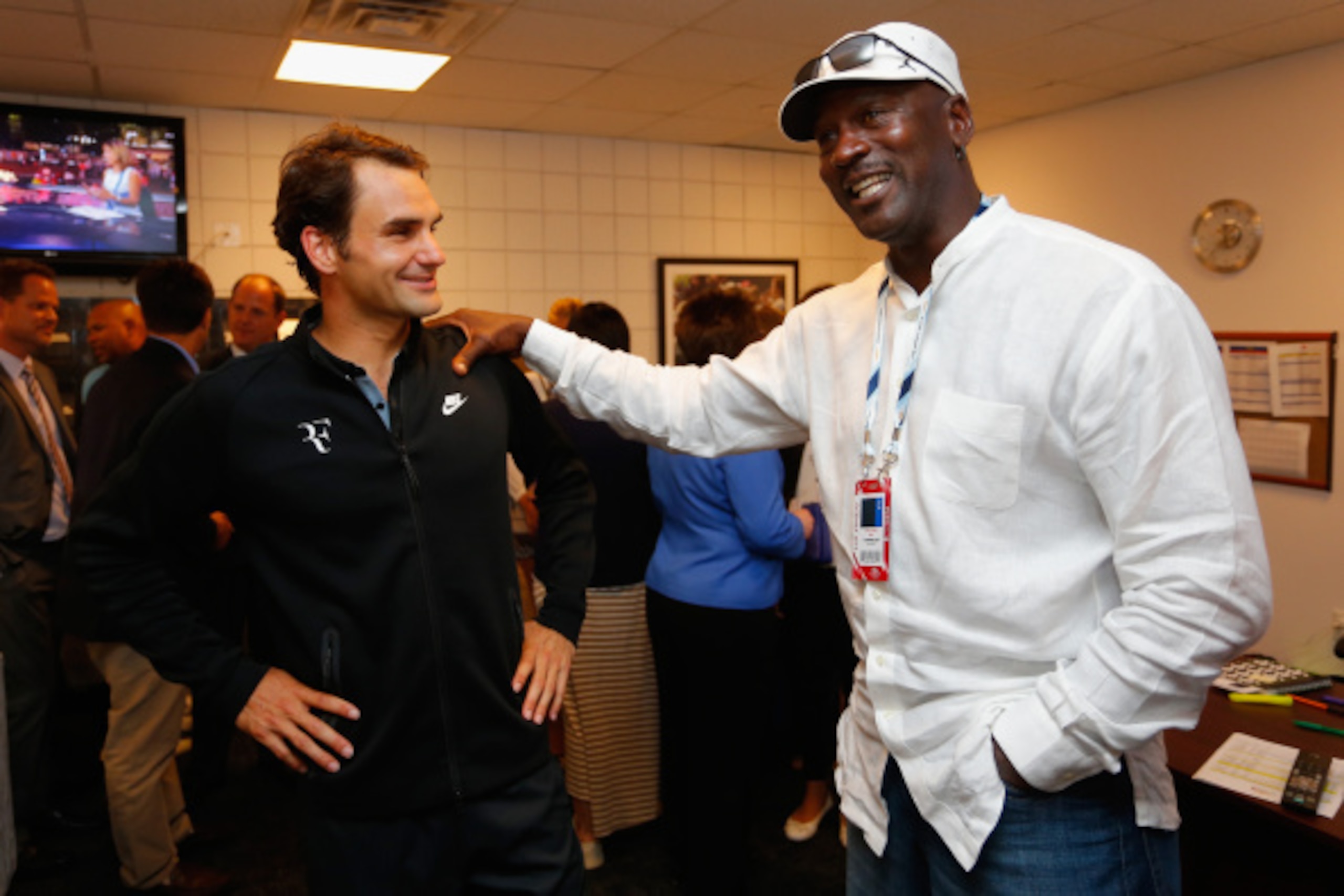 NEW YORK, NY - AUGUST 26:  Roger Federer of Switzerland and basketball Hall of Famer Michael Jordan meet following a match on Day Two of the 2014 US Open at the USTA Billie Jean King National Tennis Center on August 26, 2014 in the Flushing neighborhood o