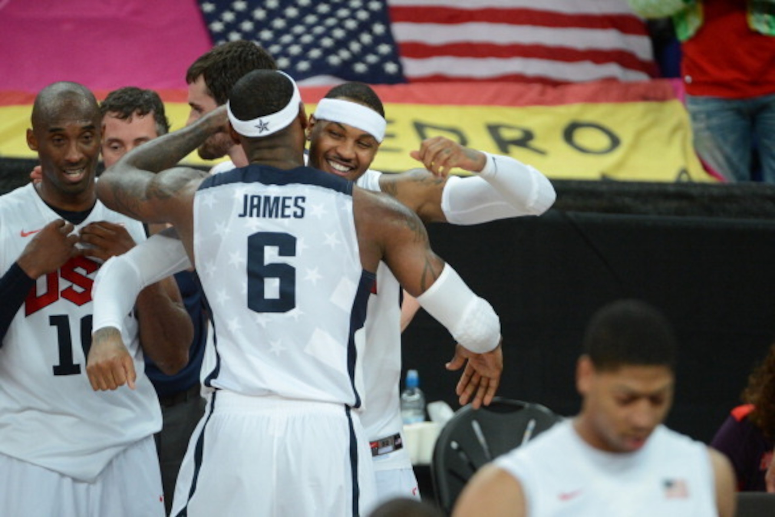 LONDON, ENGLAND - AUGUST 12: Carmelo Anthony #15 and LeBron James #6 of the US Men's Senior National Team celebrates against Spain during their Men's Gold Medal Basketball Game on Day 16 of the London 2012 Olympic Games at the North Greenwich Arena on Aug