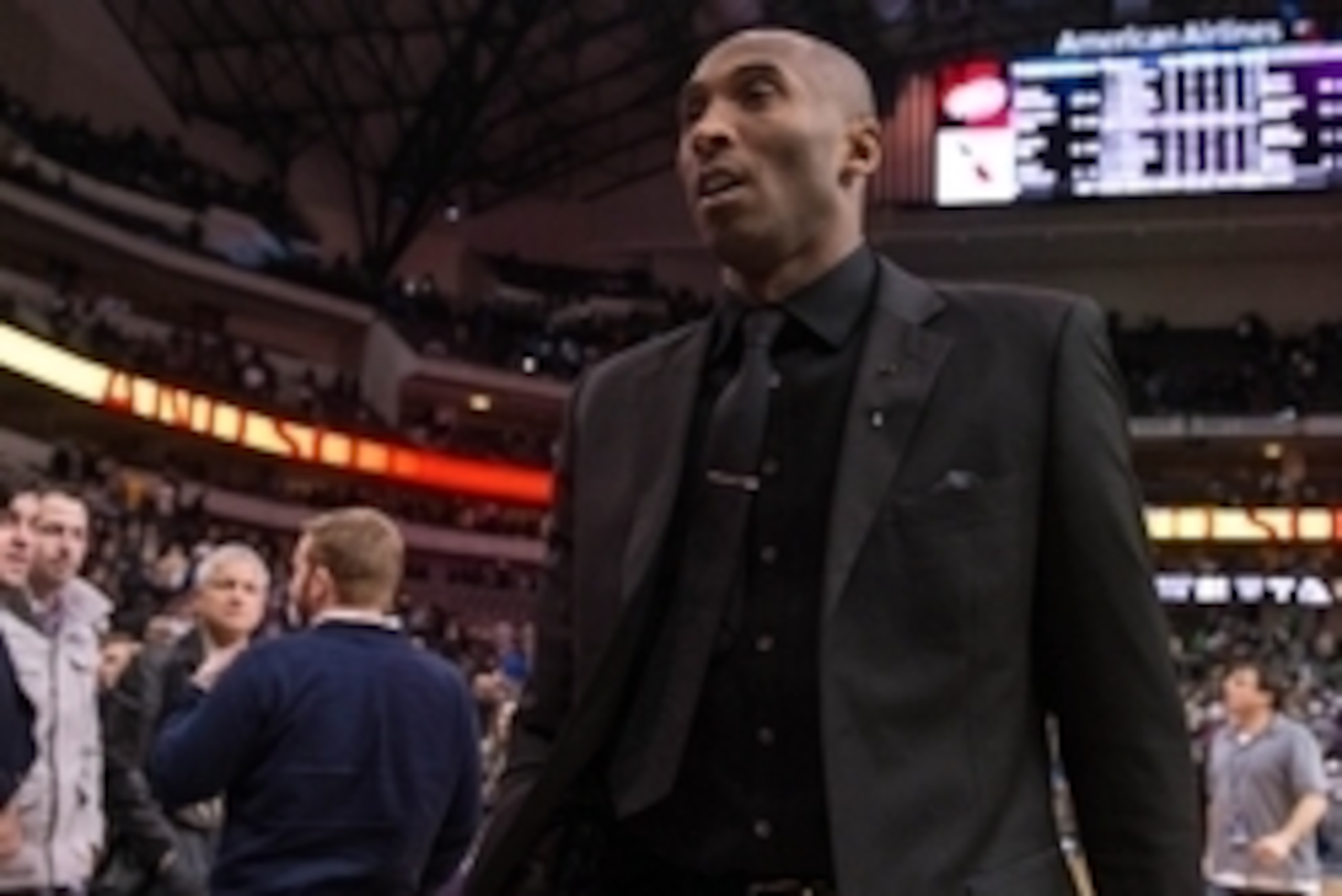 Jan 7, 2014; Dallas, TX, USA; Los Angeles Lakers shooting guard Kobe Bryant (24) comes off the court after the game against the Dallas Mavericks at the American Airlines Center. The Mavericks defeated the Lakers 110-97. Mandatory Credit: Jerome Miron-USA