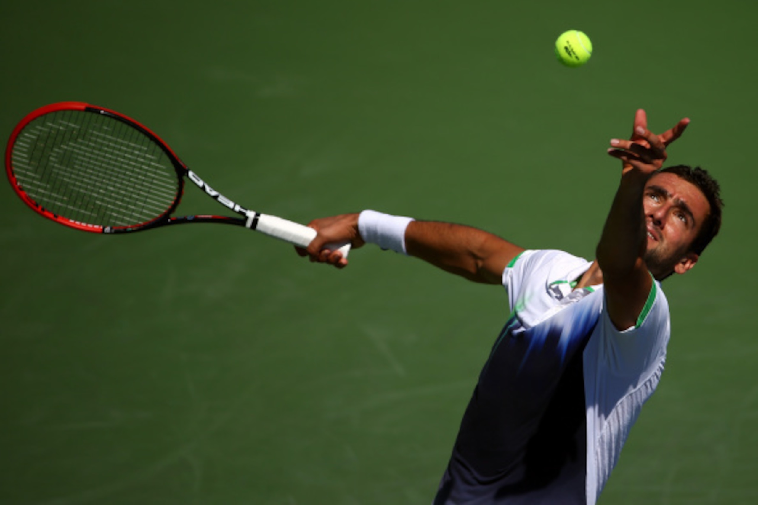 NEW YORK, NY - AUGUST 29:  Marin Cilic of Croatia returns a shot Illya Marchenko of Ukraine in their men's singles second round match on Day Five of the 2014 US Open at the USTA Billie Jean King National Tennis Center on August 29, 2014 in the Flushing ne