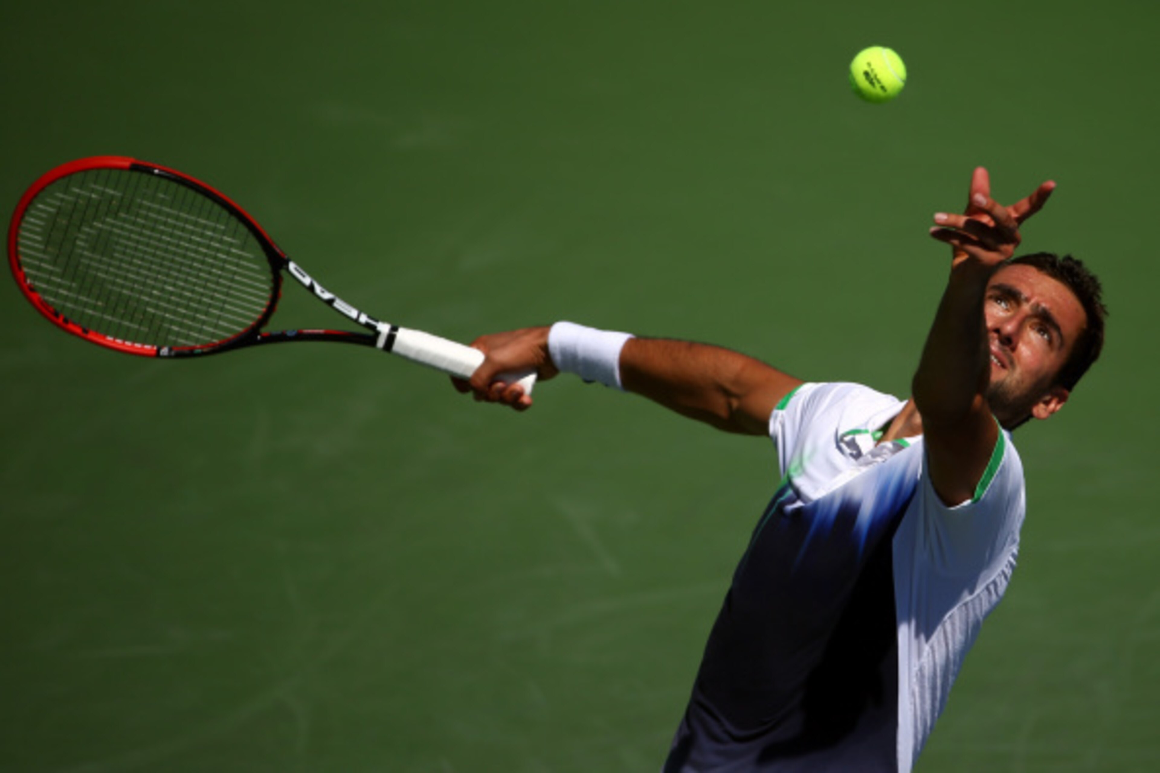 NEW YORK, NY - AUGUST 29:  Marin Cilic of Croatia returns a shot Illya Marchenko of Ukraine in their men's singles second round match on Day Five of the 2014 US Open at the USTA Billie Jean King National Tennis Center on August 29, 2014 in the Flushing ne