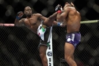 Jan 15, 2014; Duluth, GA, USA; Yoel Romero ( red gloves) fights Derek Brunson during UFC Fight Night at Gwinnett Center. Mandatory Credit: Joshua S. Kelly-USA TODAY Sports