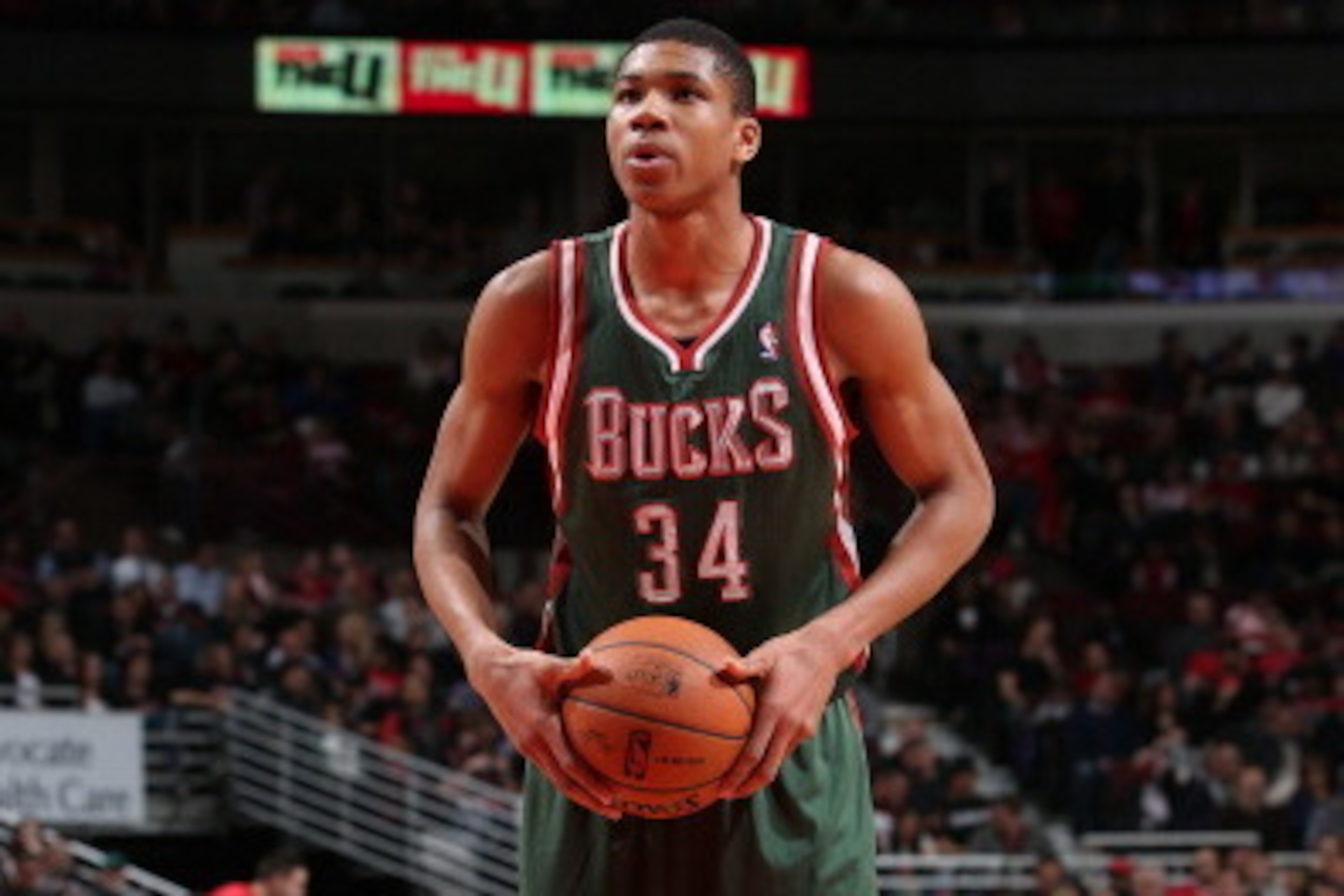 CHICAGO, IL - APRIL 4: on April 04, 2014 Giannis Antetokounmpo #34 of the Milwaukee Bucks shoots a free throw during the game against the Chicago Bulls at the United Center in Chicago, Illinois. NOTE TO USER: User expressly acknowledges and agrees that, b CHICAGO, IL - APRIL 4: on April 04, 2014 Giannis Antetokounmpo #34 of the Milwaukee Bucks shoots a free throw during the game against the Chicago Bulls at the United Center in Chicago, Illinois. NOTE TO USER: User expressly acknowledges and agrees that, b
