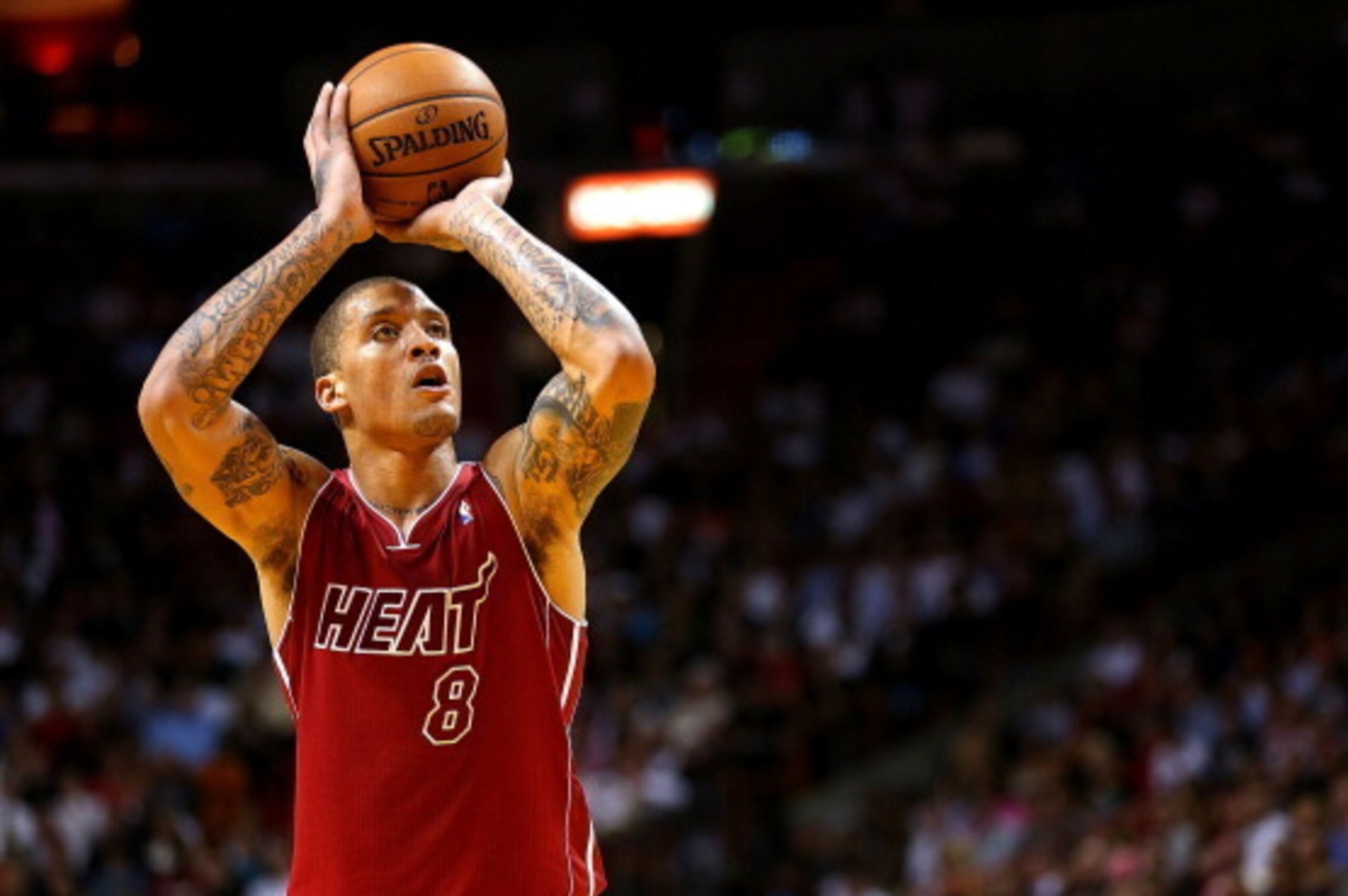 MIAMI, FL - DECEMBER 03:  Michael Beasley #8 of the Miami Heat shoots a free throw during a game against the Detroit Pistons at American Airlines Arena on December 3, 2013 in Miami, Florida. NOTE TO USER: User expressly acknowledges and agrees that, by do