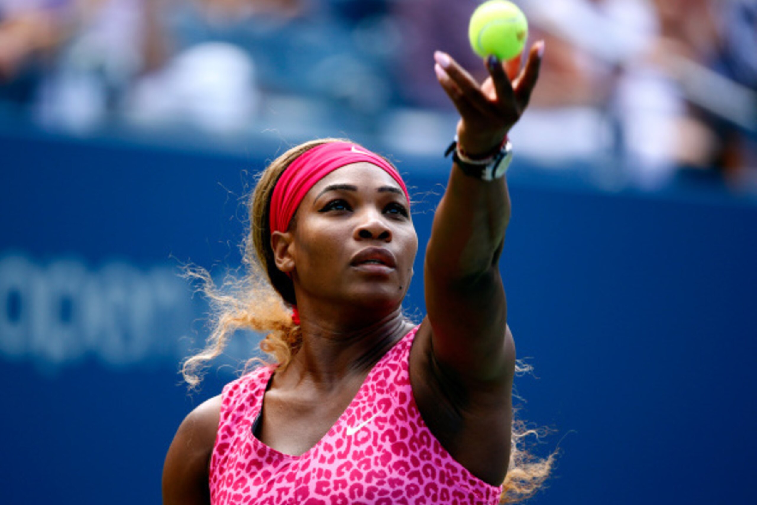 NEW YORK, NY - AUGUST 28:  Serena Williams of the United States returns a shot against Vania King of the United States during their women's singles second round match on Day Four of the 2014 US Open at the USTA Billie Jean King National Tennis Center on A